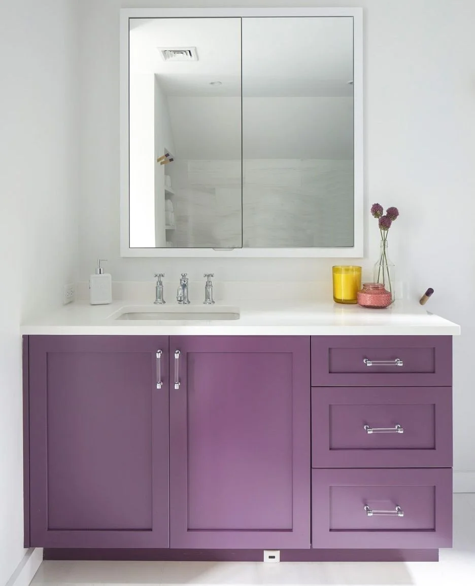 Dark at 4pm? We're adding some brightness to your feed (and your home!) 💜✨⁠
⁠
A bold, rich color like this vanity is the perfect way to inject personality and light into a small space, especially when paired with clean white countertops and walls. W