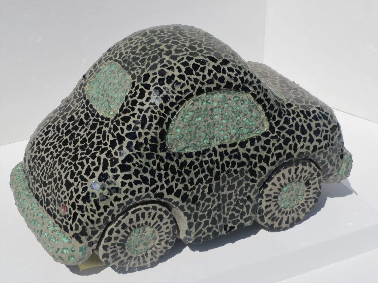 Linda Schmidt…”Auto Glass Auto” sculpture 8x13x8 ( $200).jpg