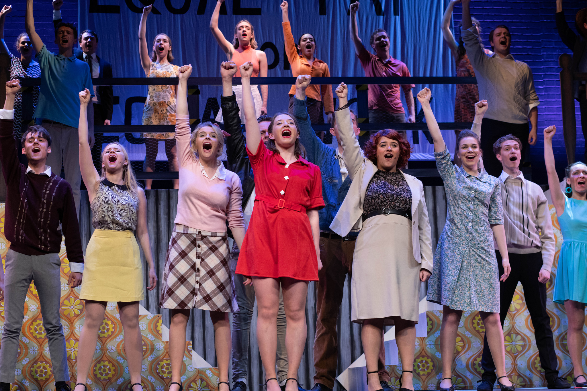 Maddy Page (playing Rita O’Grady), centre, wearing ‘that’ dress.