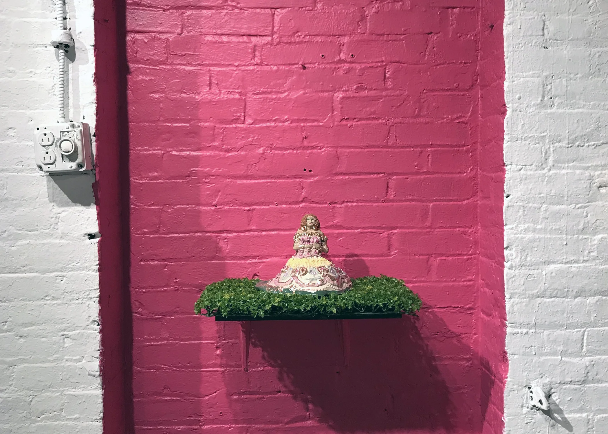 Mis Cuarentas/My Forties Installation (2018) clay, underglaze, plastic cabachons, and gold enamel paint.
