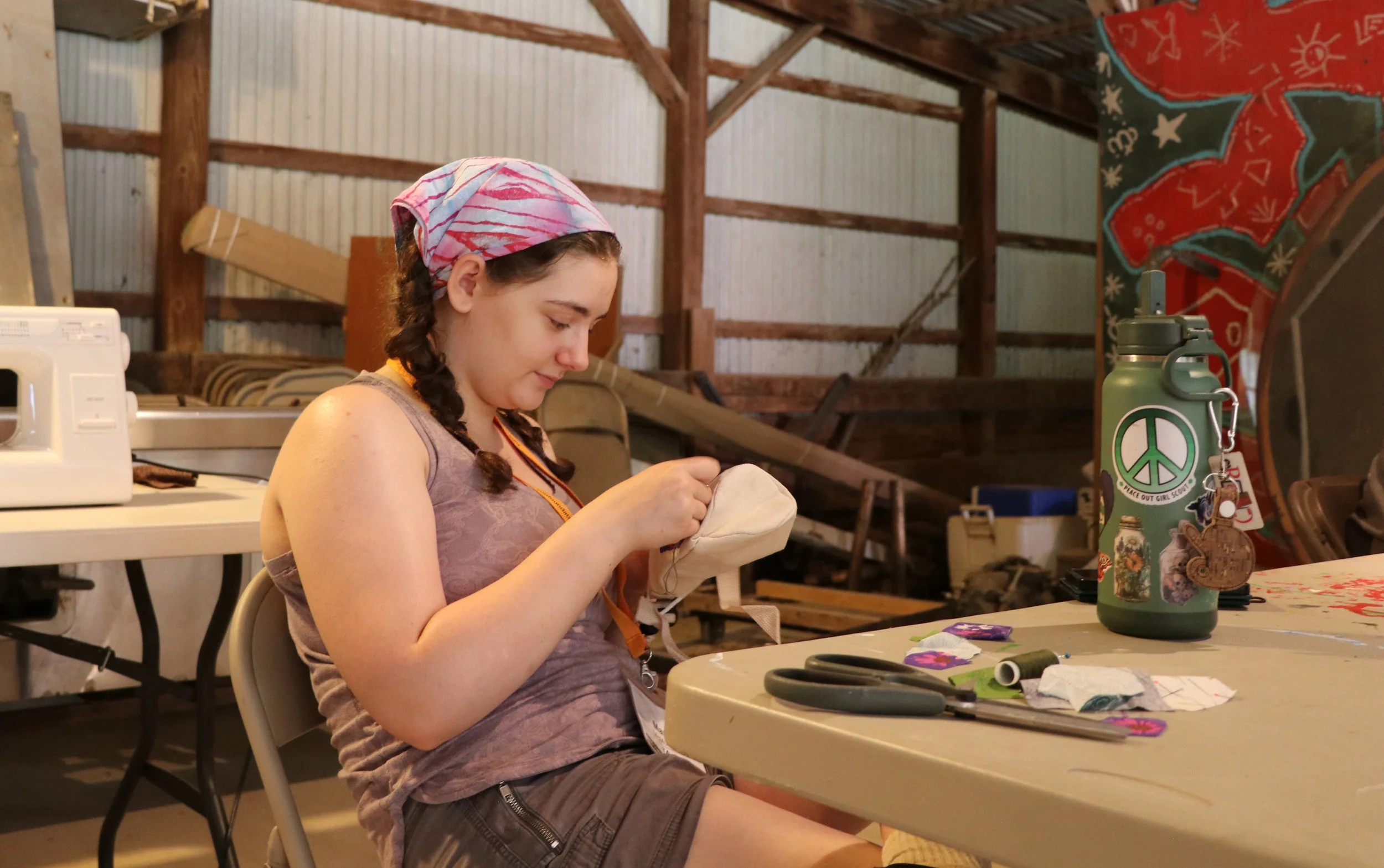 Fabric arts student sewing .JPG