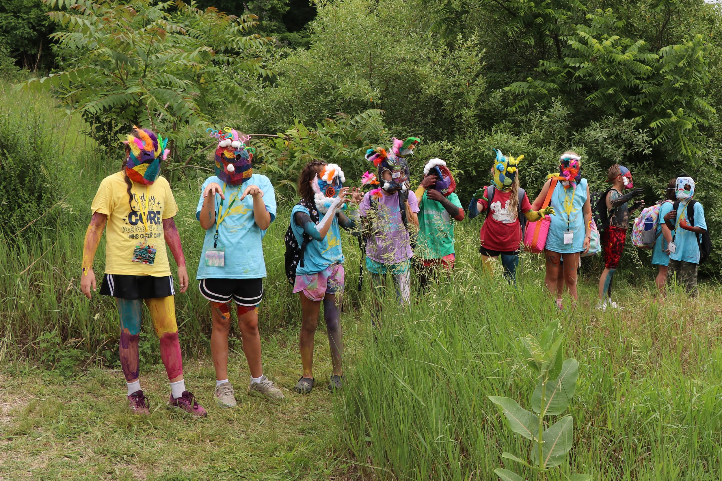 Mixed media masks on trail .jpg