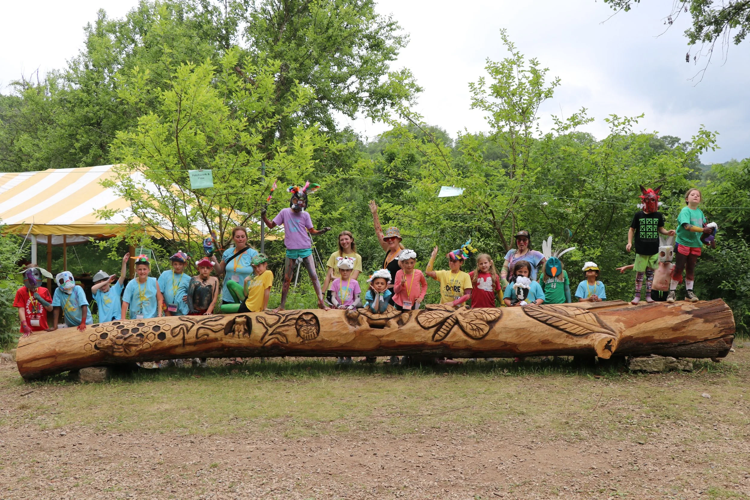 Mixed media on carved log .jpg