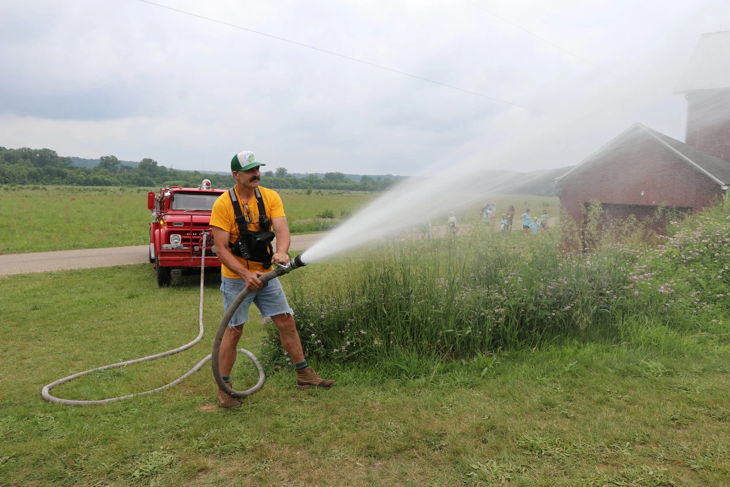 Staff Eric firehose .jpg