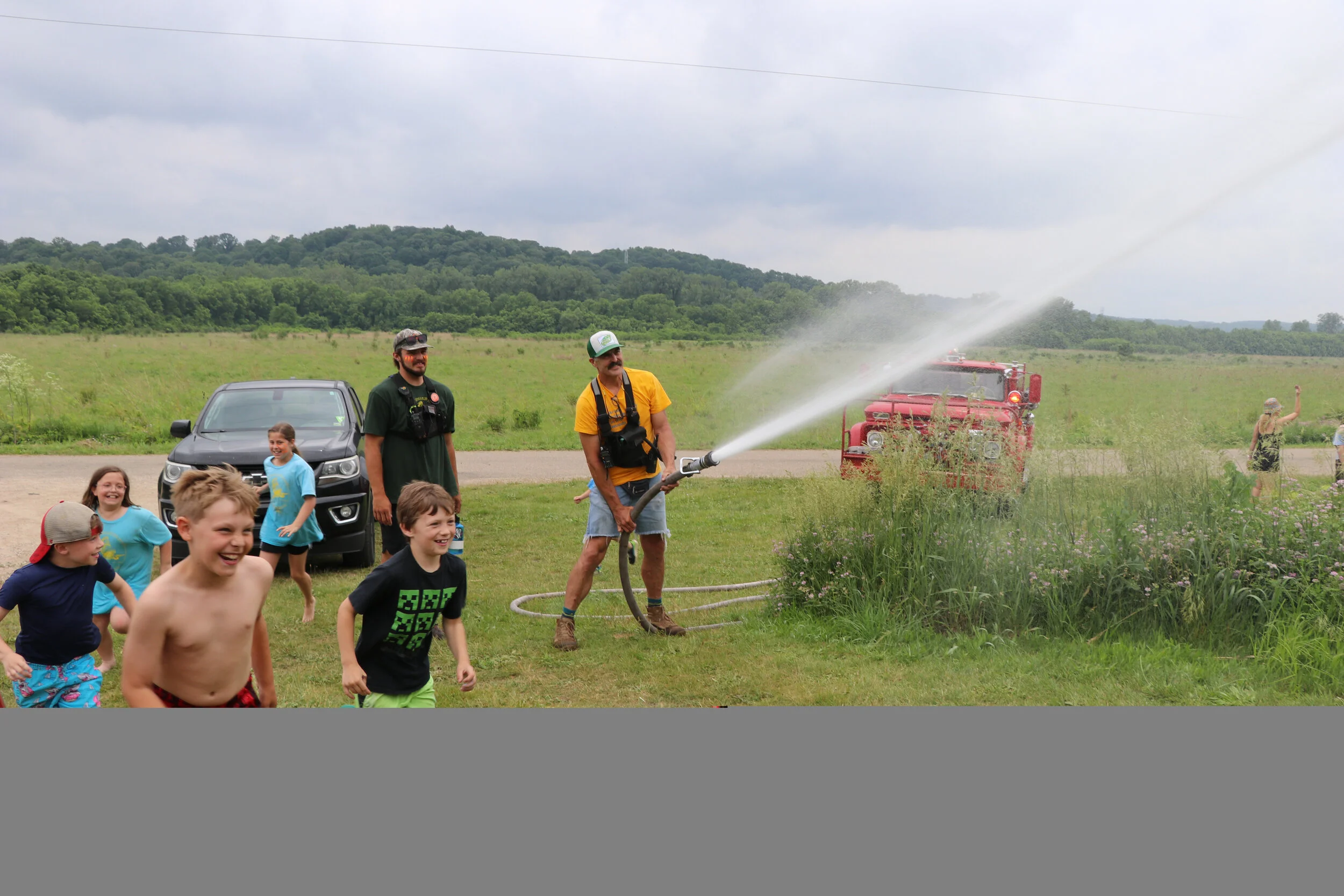Staff Eric firehose 2 .jpg