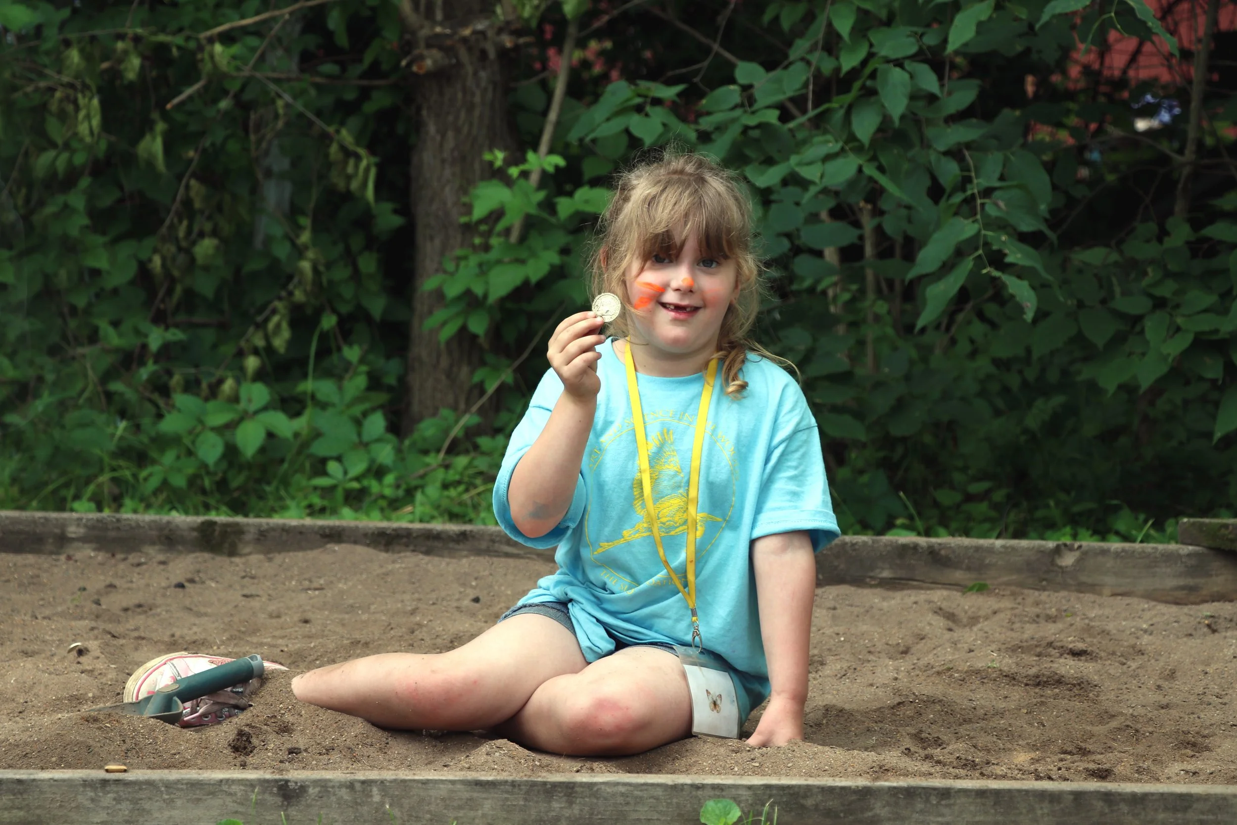 Student w treasure sandbox .JPG