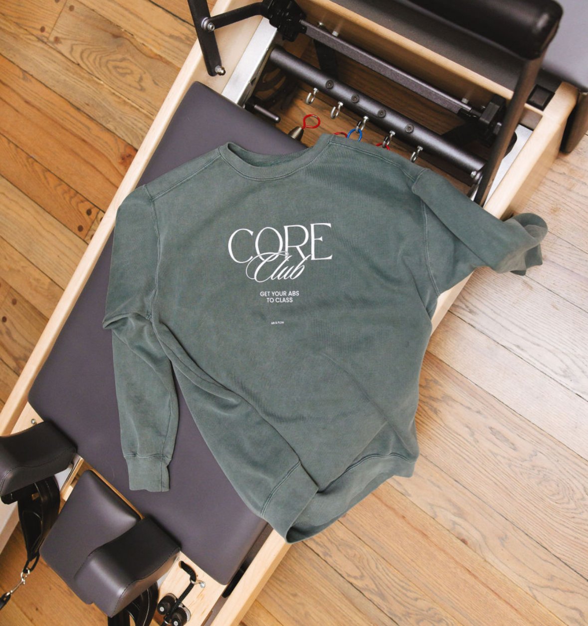 Sweatshirt on reformer.jpeg