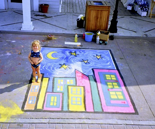 Andy’s second time to participate. He was sponsored by Hawkins & Arnold art gallery again. Here’s our daughter Taylor (age 2) posing with Andy’s painting, which wasn’t quite finished. (Seaside – April 1999)