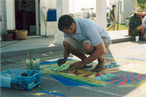 Andy (age 20) working hard on his street painting. (Seaside – April 1998)