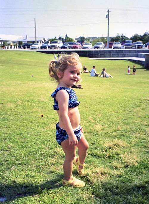 Here’s our daughter Taylor in Seaside. The landscape has changed a lot over the years, especially with the addition of the airstream trailers. (Seaside – April 1999)