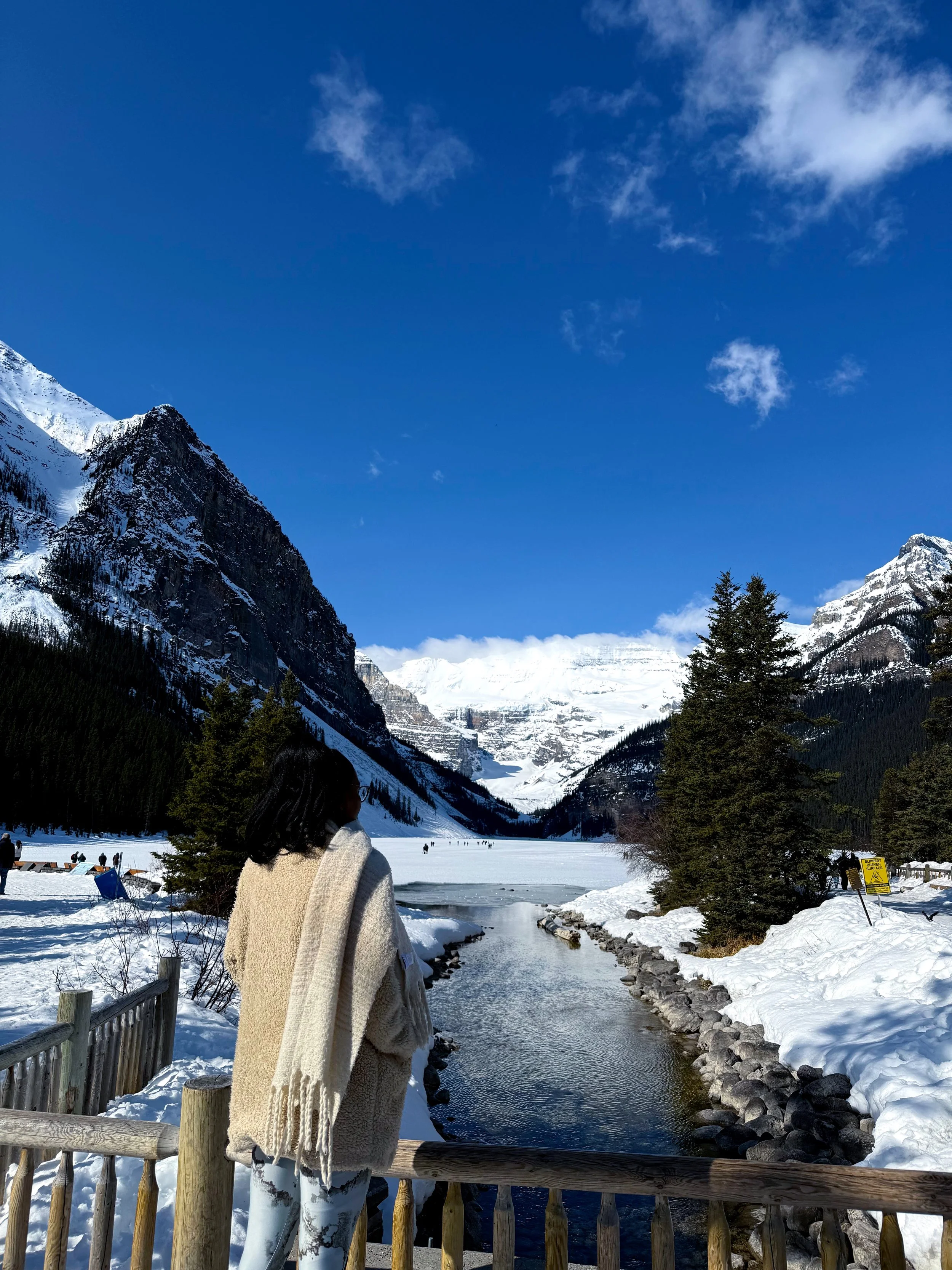 A photograph of Kris at Lake Louise in Banff National Park in Alberta Canada