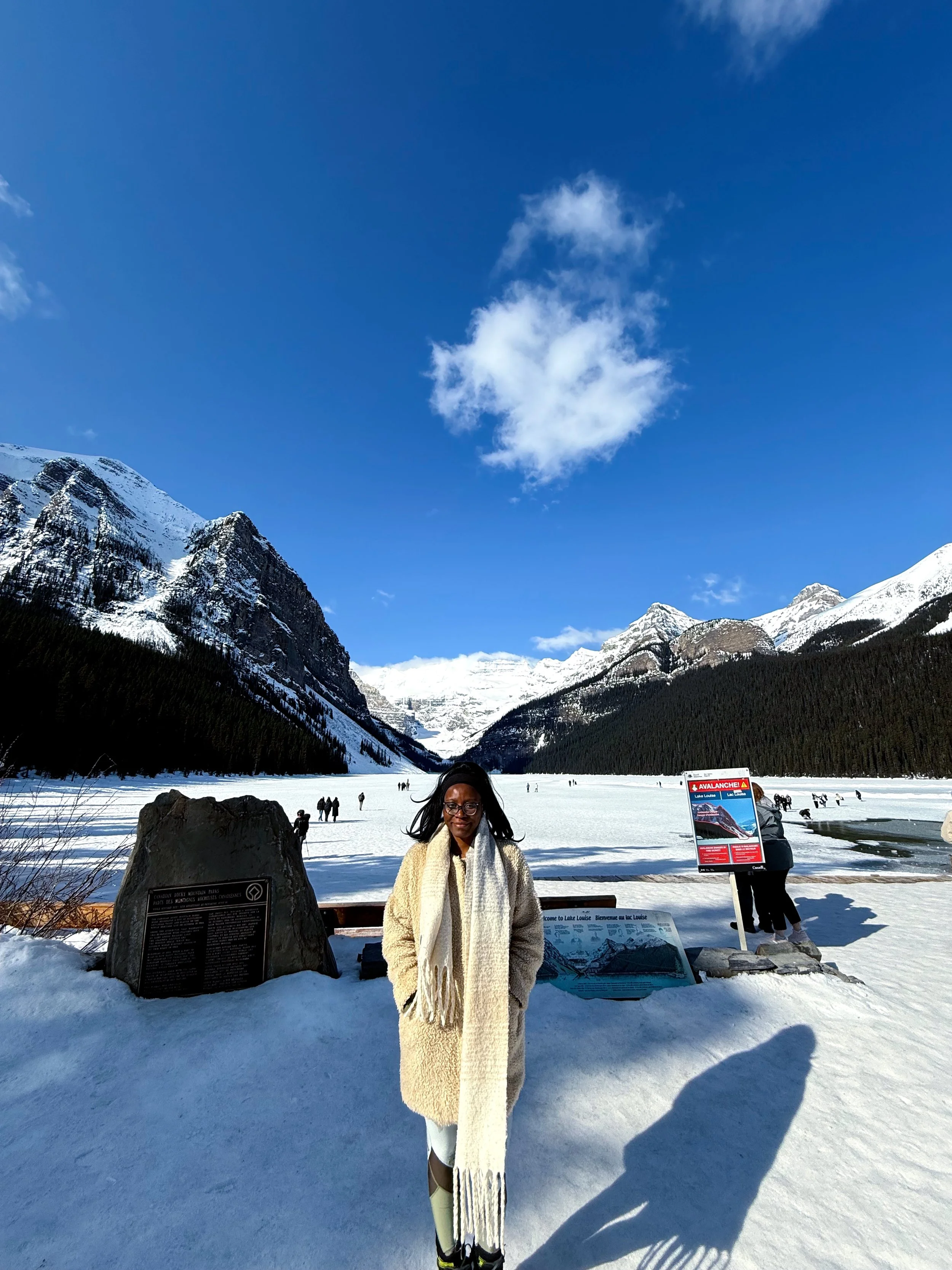 A photograph of Kris at Lake Louise in Banff National Park in Alberta Canada