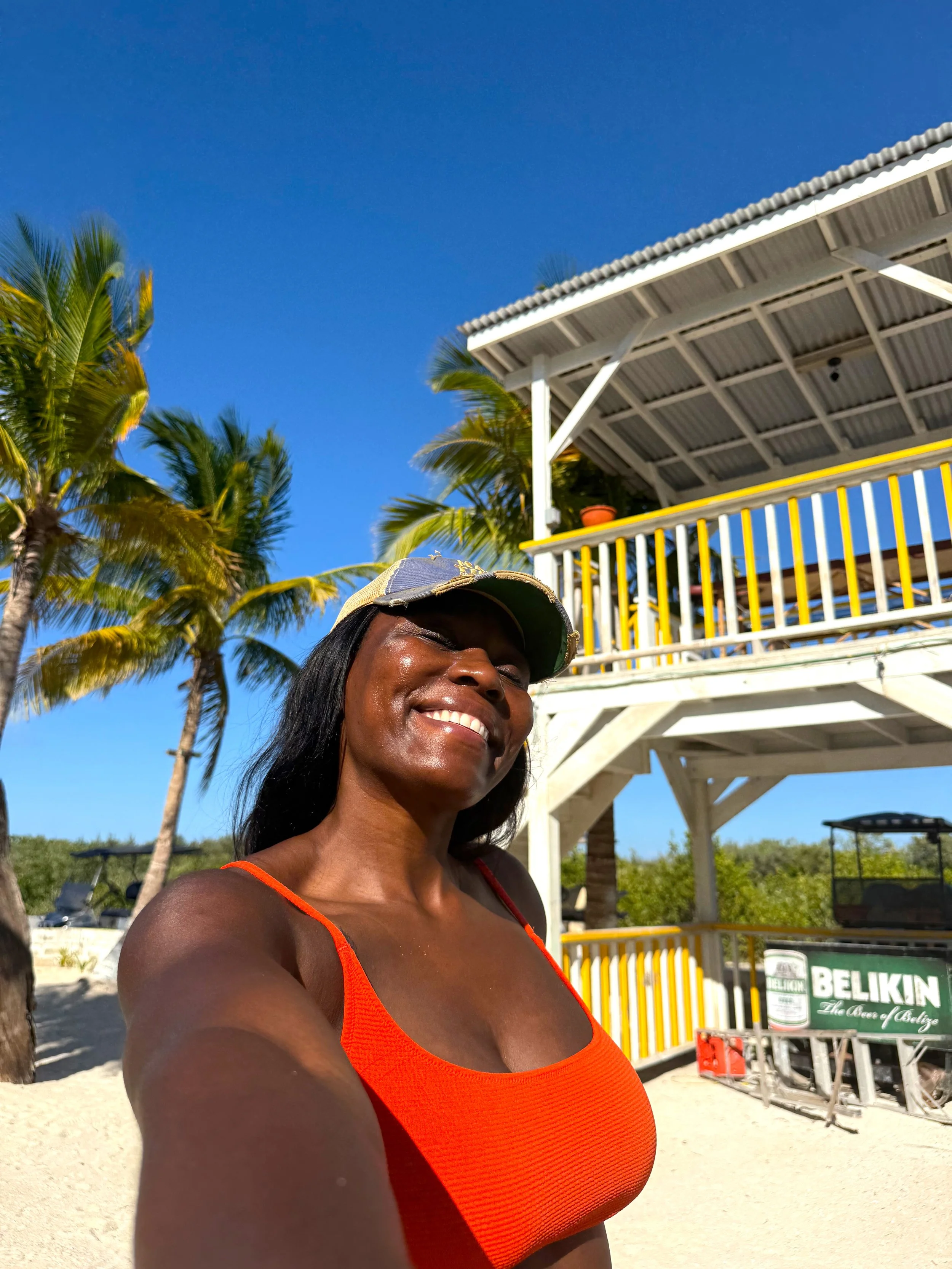 Christane smiling at Secret Beach, San Pedro, Belize