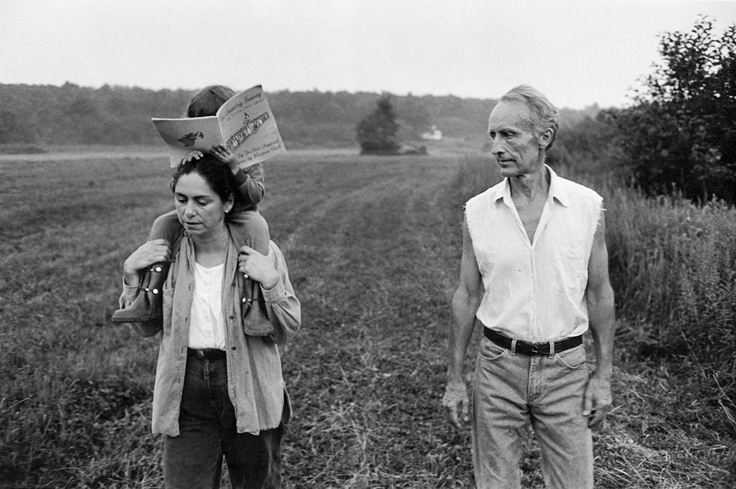 Mary Ann, carrying Eve, and my father. The house Mary Ann and I bought upstate is visible in the far background. 1985