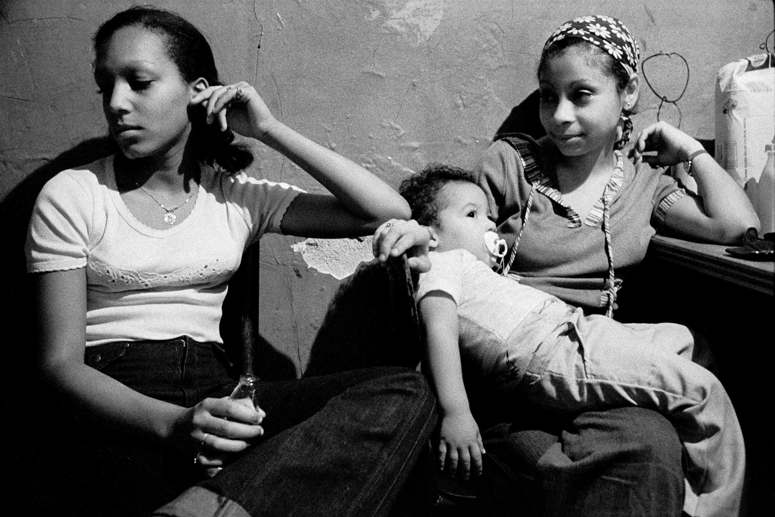 Tito in his mother’s lap on Eleventh Street. From Alphabet City . 1977