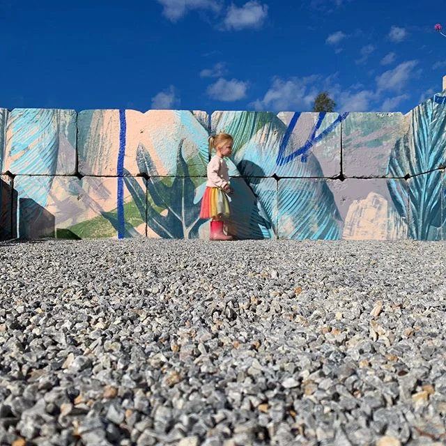 Cute Zoe rocking her gumboots and tutu combo in front of my mural for @cordeauxhouse 🥰. Slide for process pics. Really fun job where I got to embrace the texture of raw concrete 🤤🤤🤤. Thanks for the pics Paul!