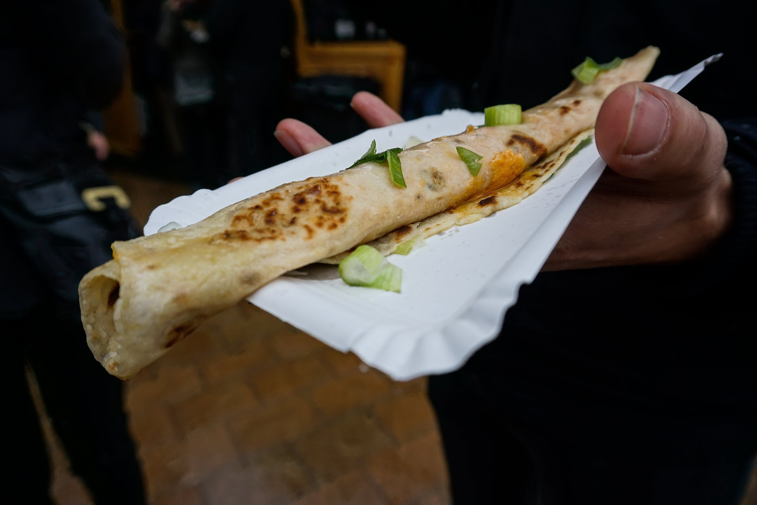 Lokše with bryndza cheese and spring onion