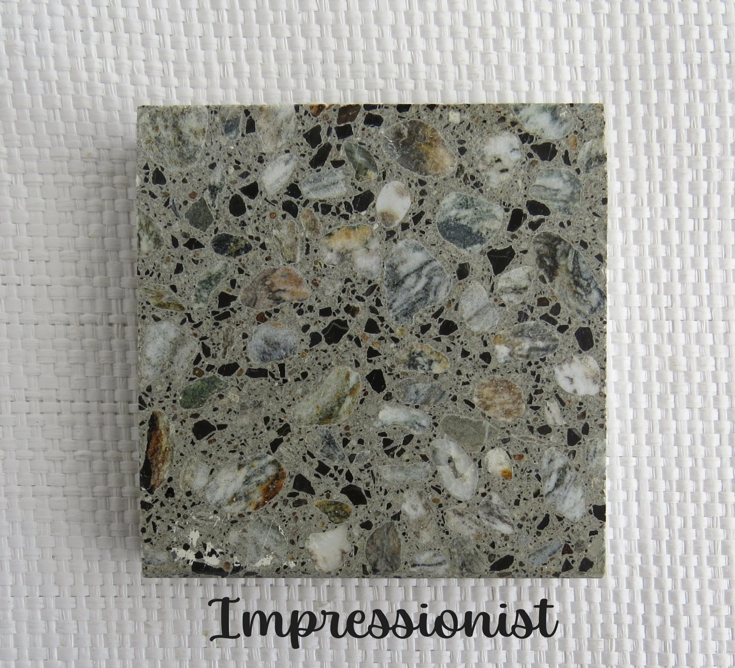 IMPRESSIONIST Tile-Nature leaves an impression in our beings that allows us to thrive. NZ Schist Pebbles in a gray base