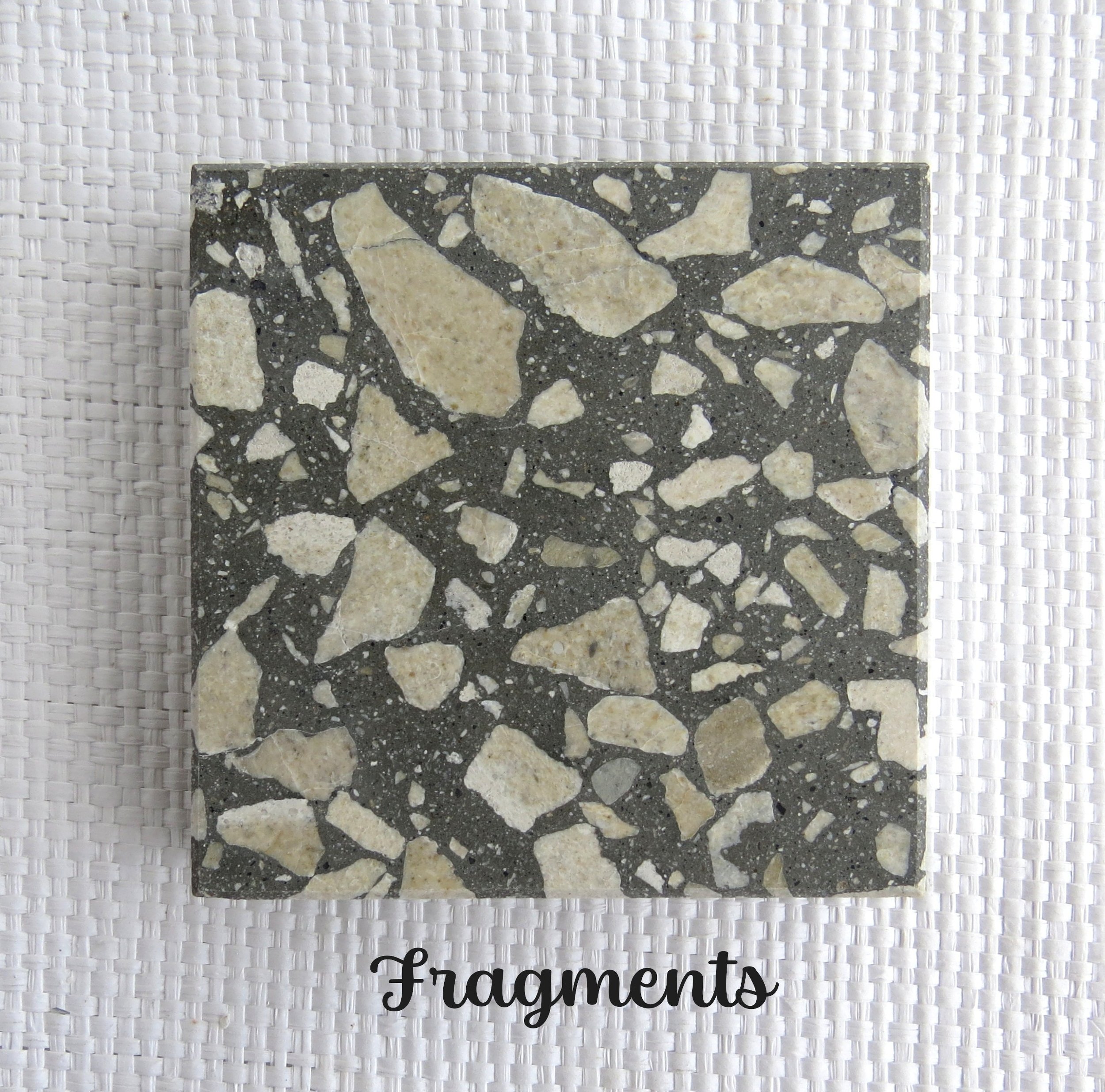 FRAGMENTS Tile- archaeologists dig deep in the earth to discover the fragments of our past. To piece together who we are.  What fragments will we leave? NZ Waikato Aggregates in a dark gray base