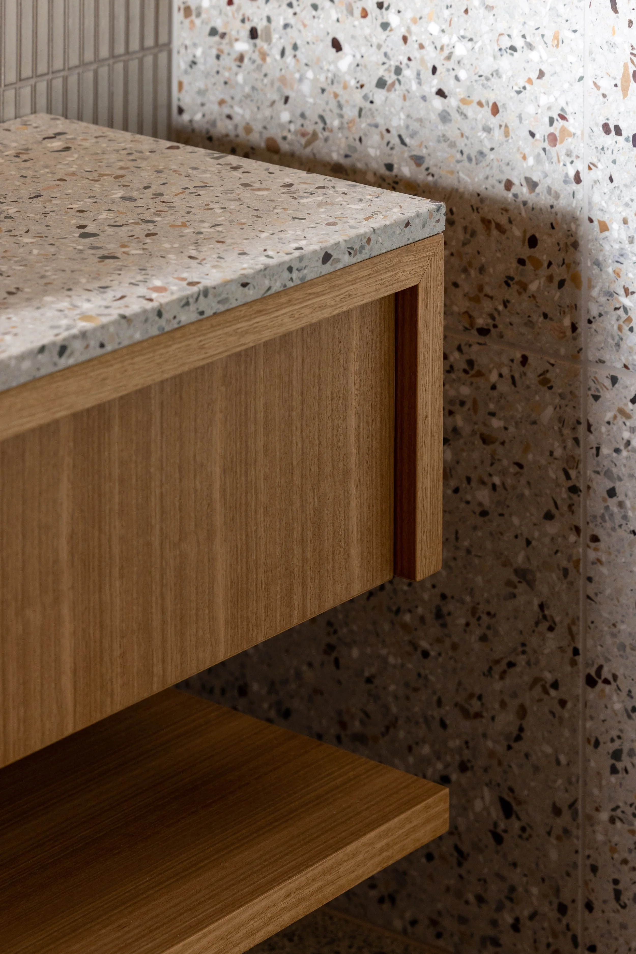 close up wall and vanity Matapouri Bay Terrazzo tile.jpg