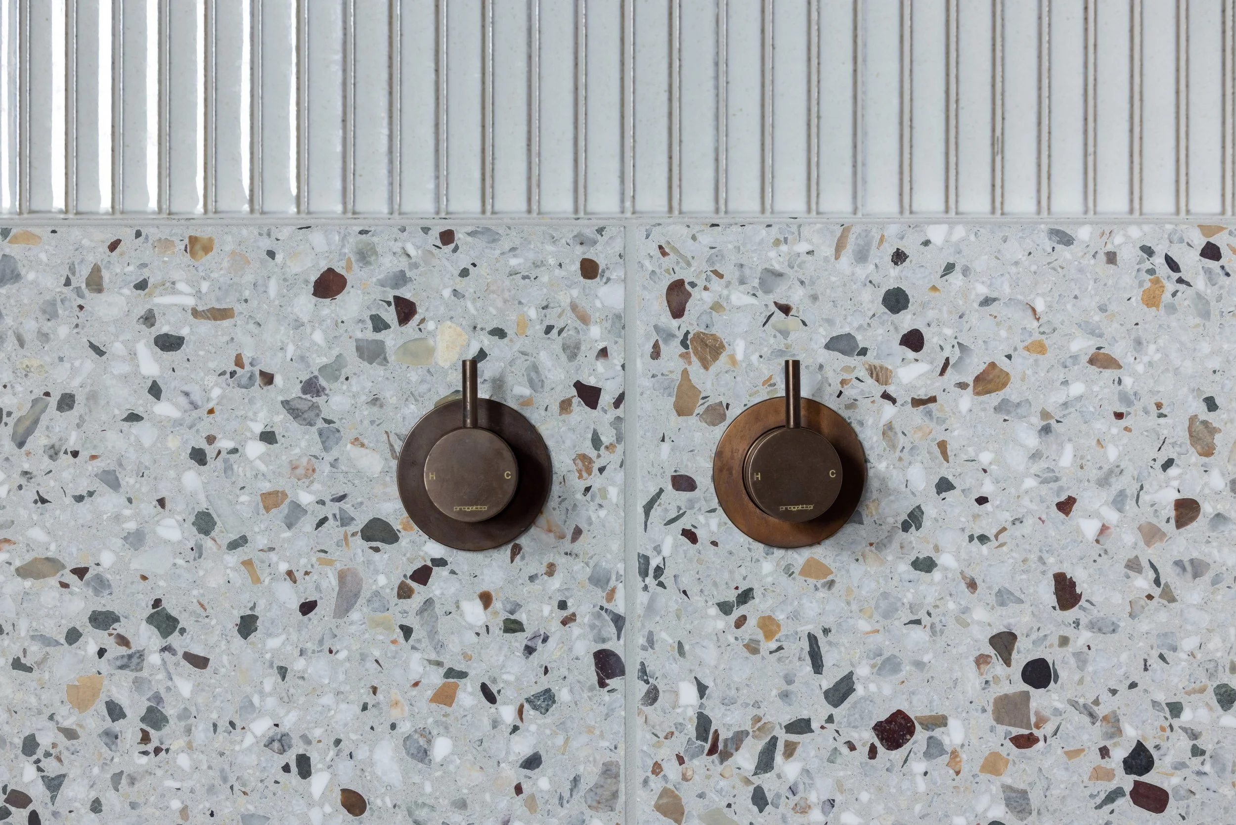 close up taps on tiles Matapouri bay .jpg