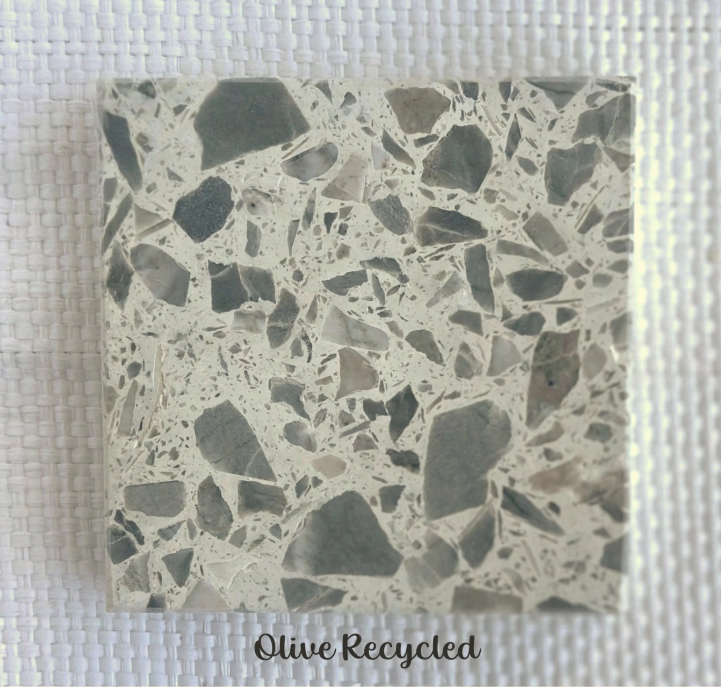 OLIVE- RECYCLED -a green gray marble that has a ghostly transparence like days gone past,  but still remembered. Recycled Olive coloured marble in a white base. There is limited stock of this colour. 