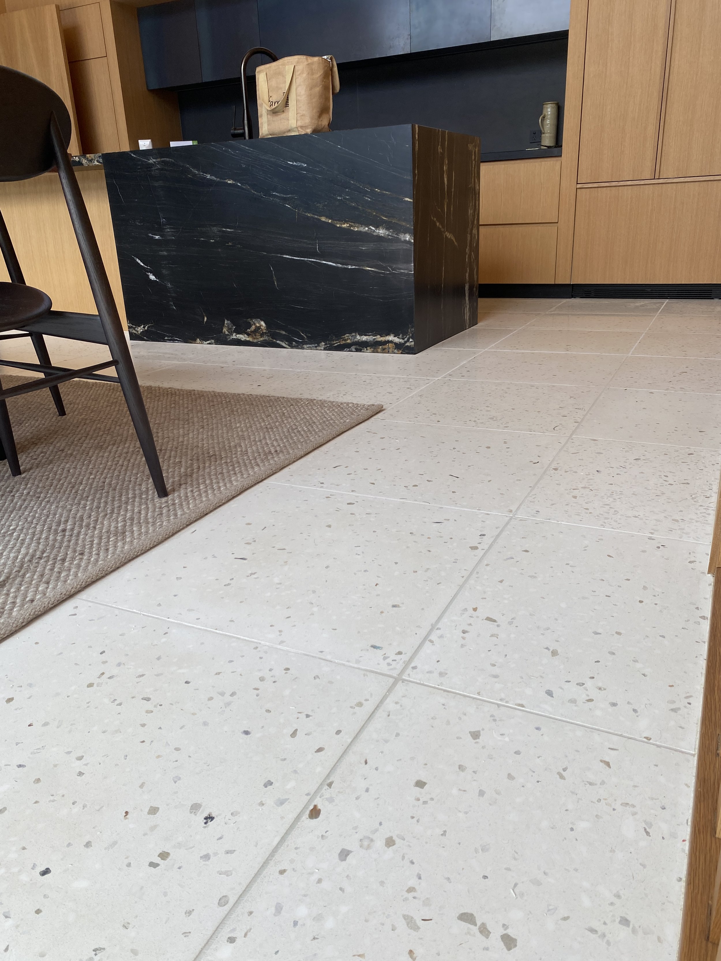 White bespoke tile with special shell featured