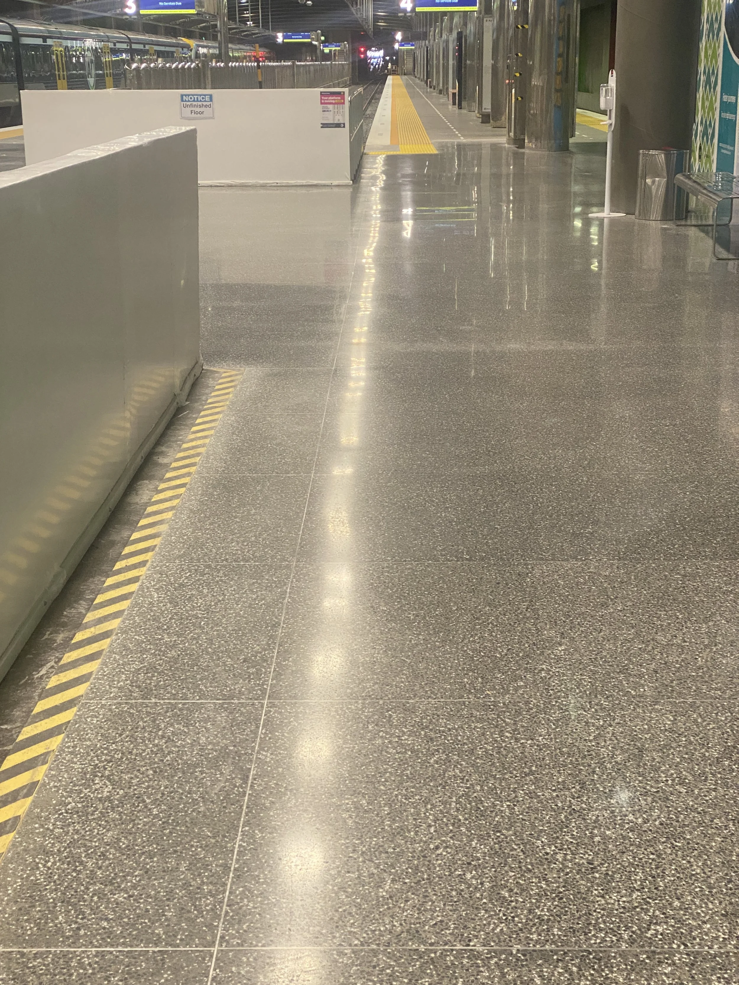 close up of Gray Insitu Terrazzo  Britomart train station platform