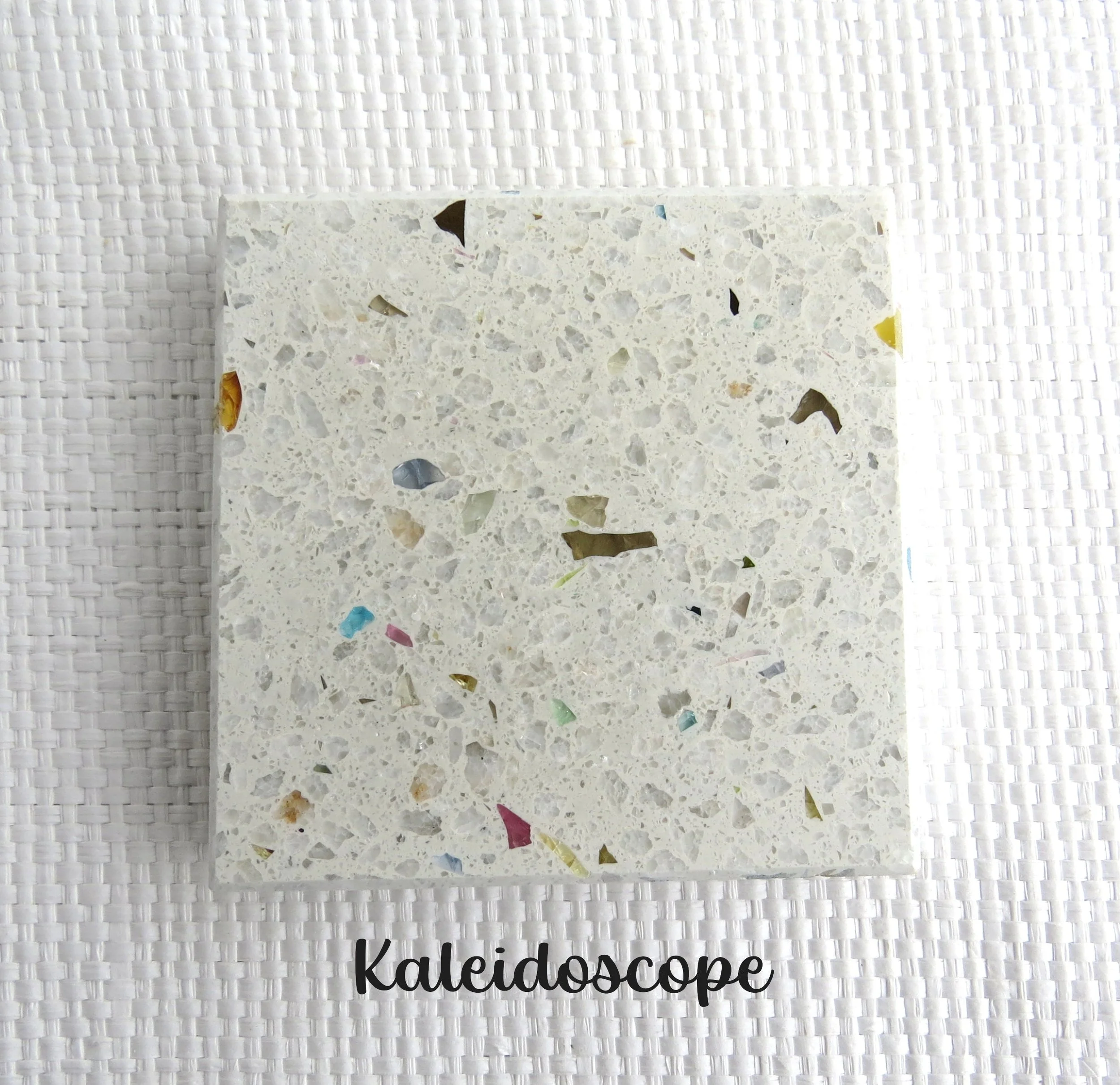 KALEIDOSCOPE Tile- Playful colours sprinkled to create happy vibes. Recycled glass, NZ white Marble in a white base. NOTE- glass colours are subject to availability