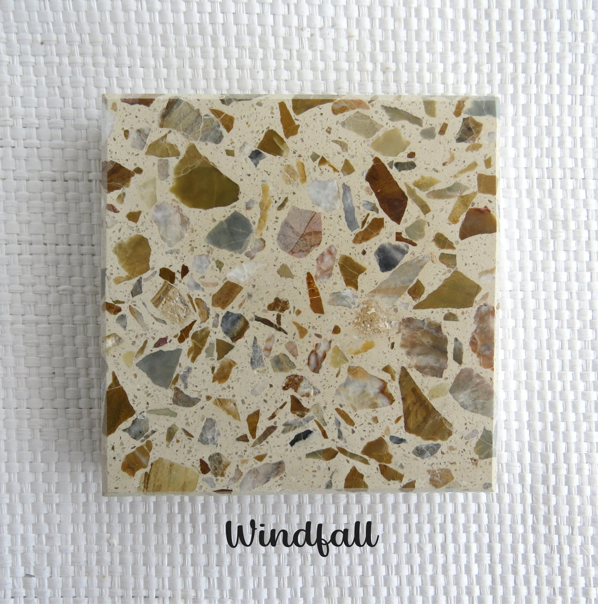 WINDFALL tile- Whether it is beautiful leaves and feathers blown in from the wind, golden treasure and jewels, getting more hokey pokey in your icecream than your  brother. A Windfall is a beautiful thing. NZ dolomite in a creamy base