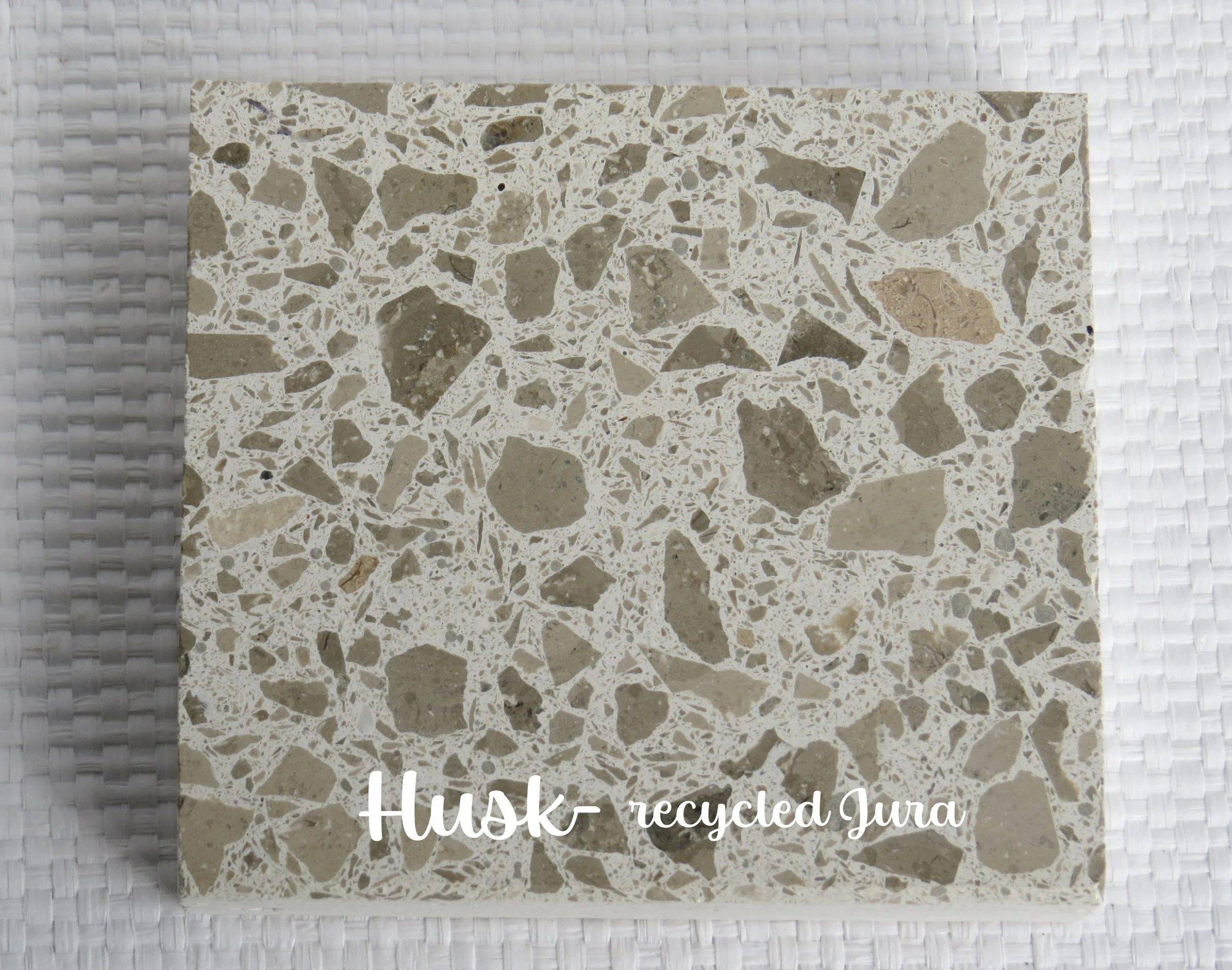 HUSK- the part that forms the protective layer around nature. Once removed is often scattered in the wind.  Made using Recycled Jura offcuts in white cement. Made in NZ. Limited availability.