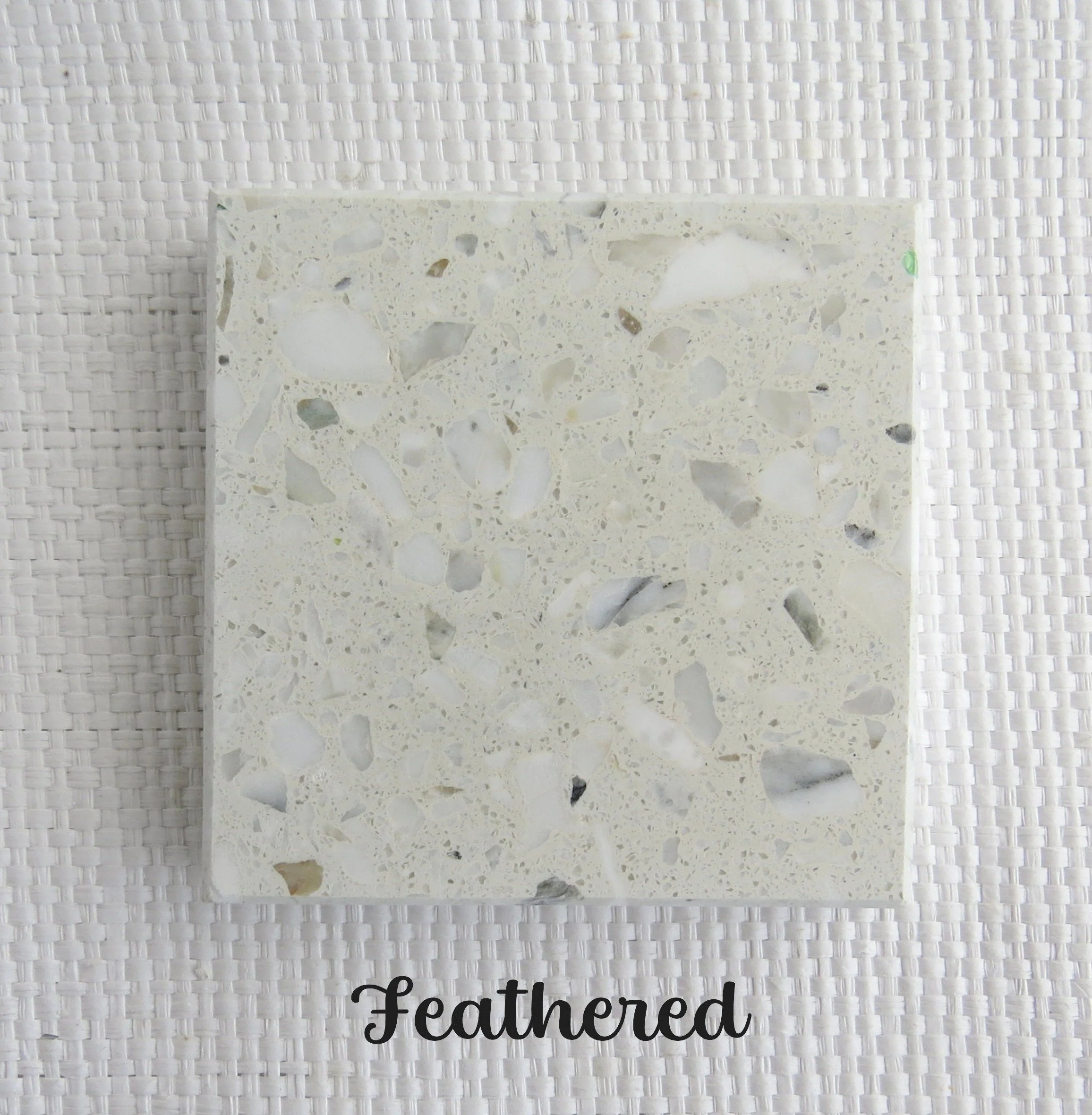 FEATHERED- Tile RECYCLED. Feathers drift in the air, carried by the whims of the wind. Recycled white marble in a white base