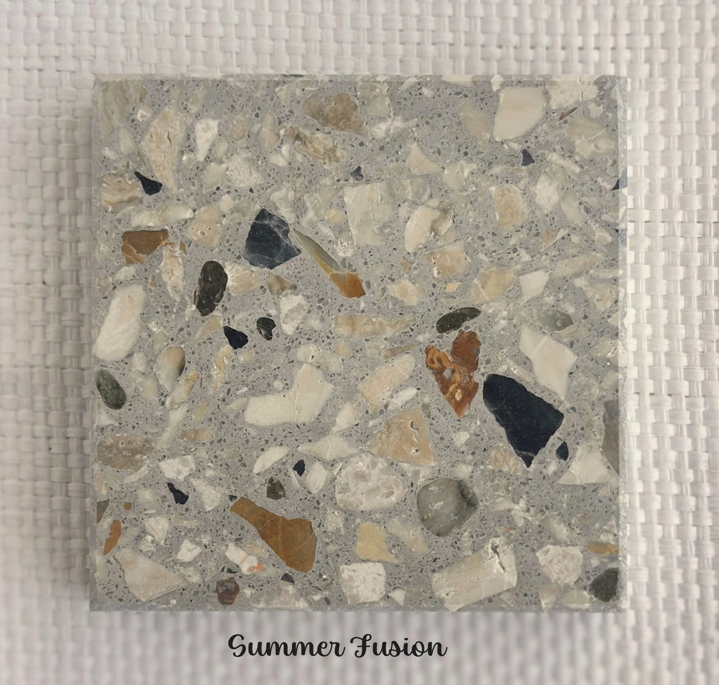 Summer Fusion- Summer colours are fused in my mind, driftwood, stones, sand and cotton tails. Made using a variety of NZ marble and limestone with a sprinkle of green from Australia in a gray base.