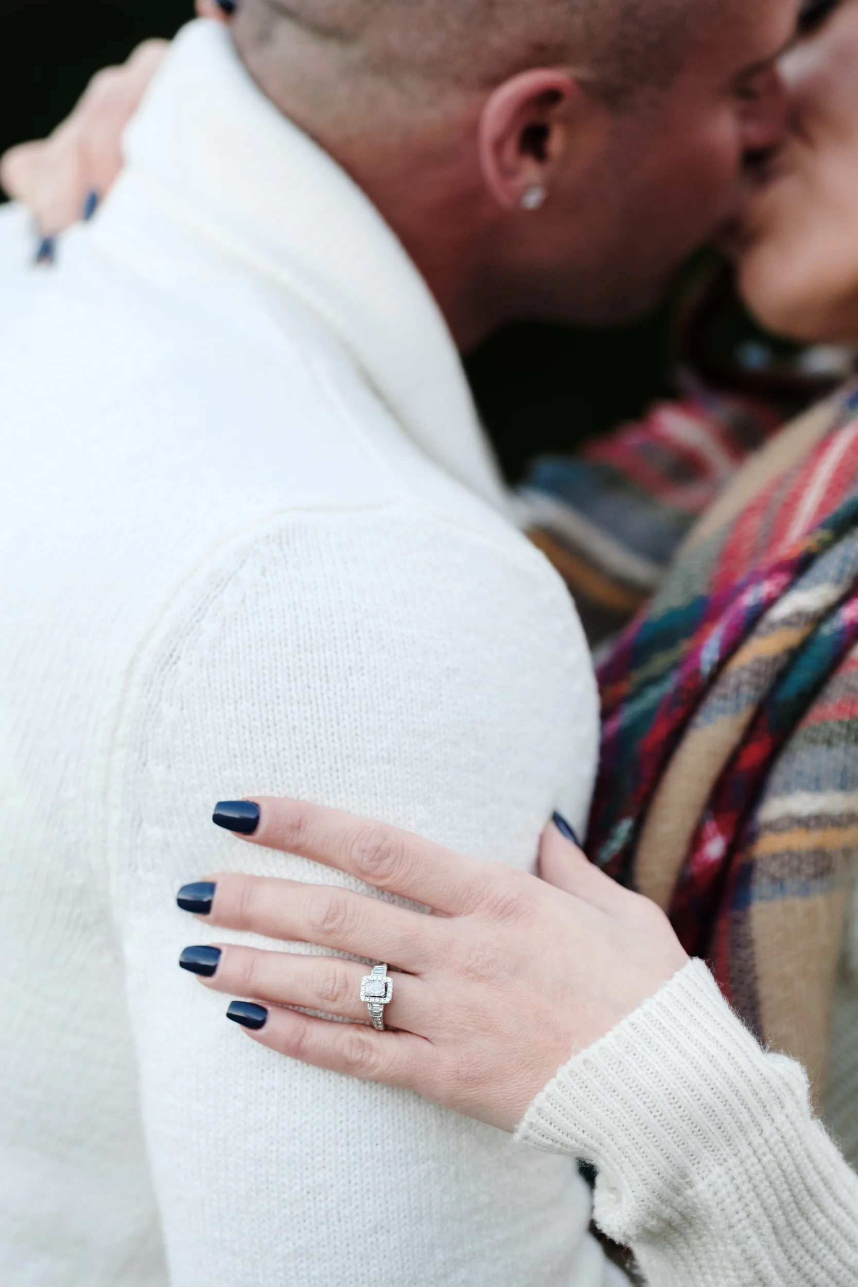 Couple embrace and kiss at Rock Cut state park in Rockford, Illinois.