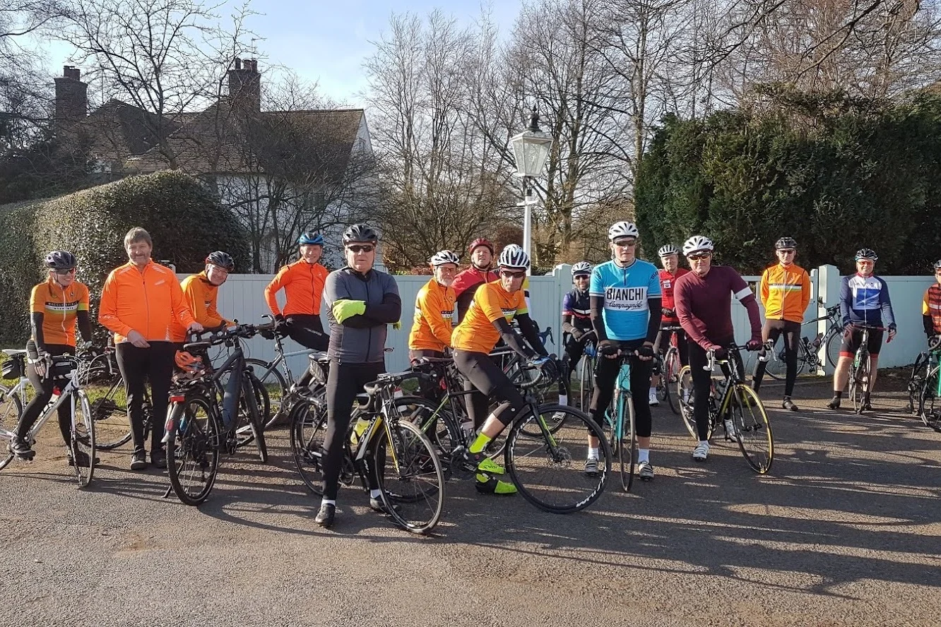 Larks line up with Larklings at base camp: Vikki, Simon, Steve, Dave, Andrew, Greg, Phil, Christian, hidden rider = new member Simon (welcome), Elliot, Steve, Matt, Mike, Ian, new rider Oliver (welcome), Mike.