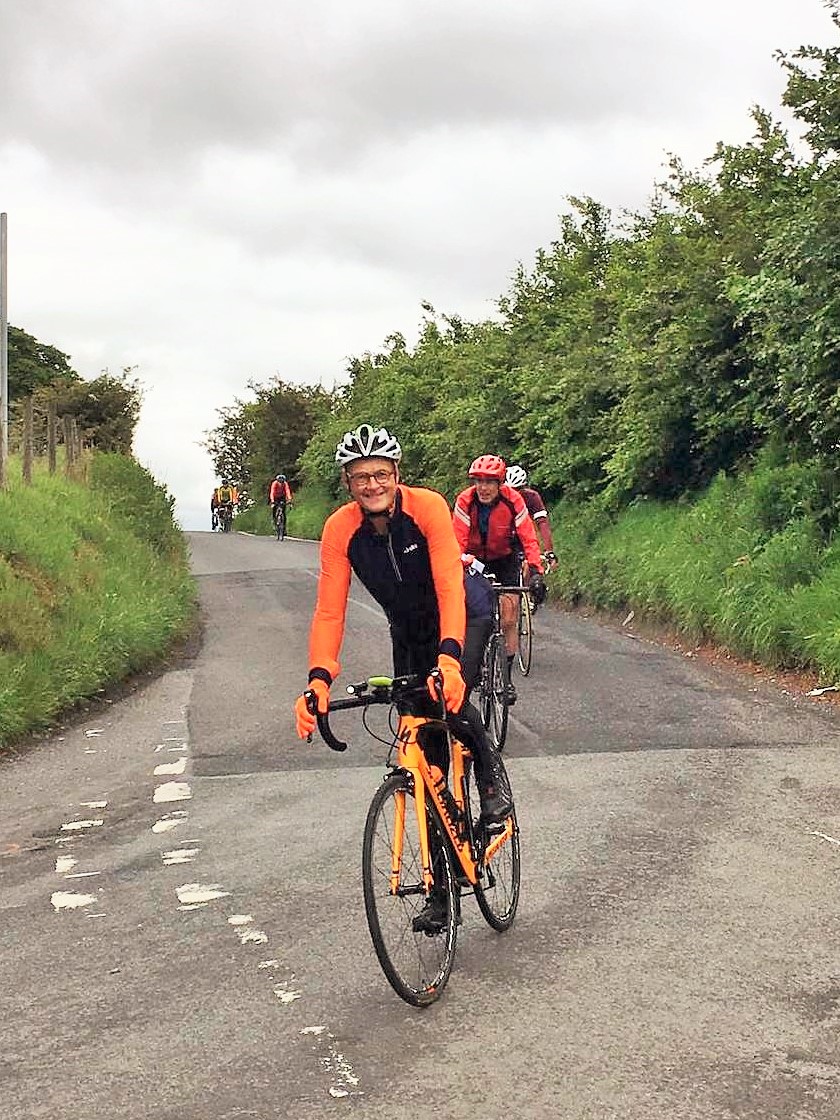 Some bloke concentrating more on his Instagram profile than where he was going, drunk no doubt on the heady wine of finally digesting his Cliff Bar at the summit of the ironically named Werneth Low Road.
