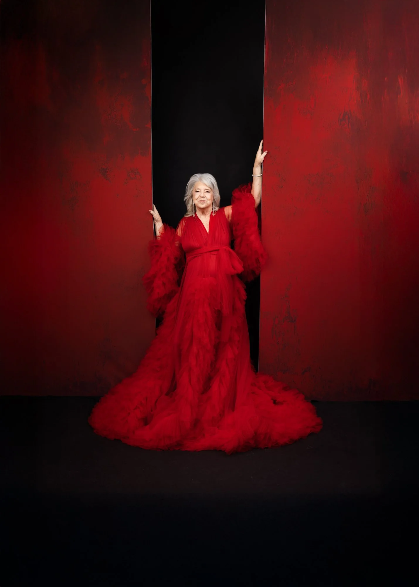Women in red dress - Breast Cancer survivor