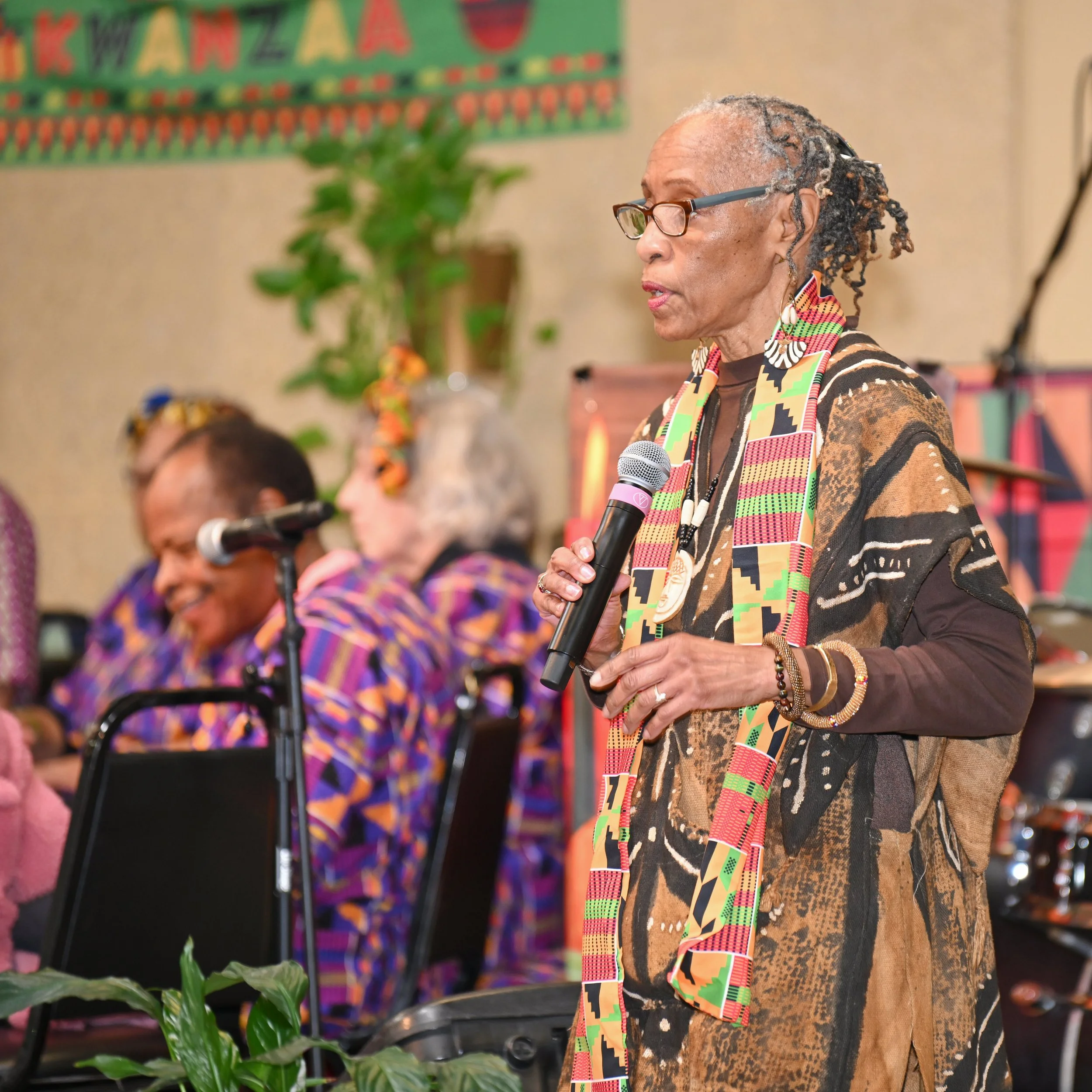 Aissata w Drummers In Backgrounnd.jpg