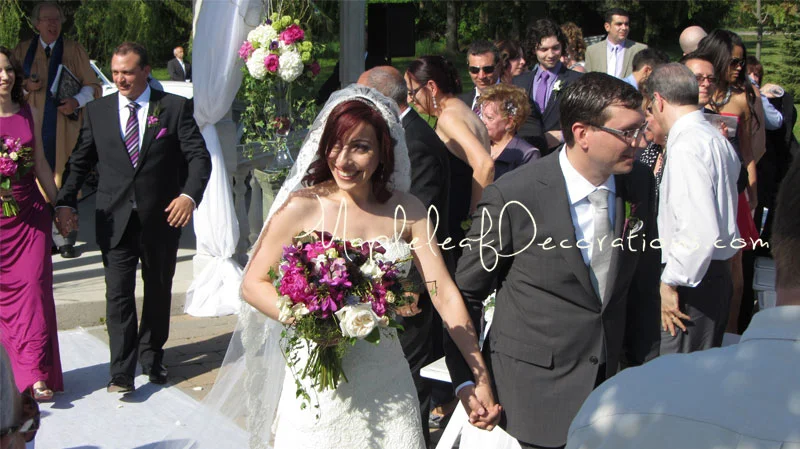 6-bride-and-groom-ceremony-decor-gazebo-pew-bows-outdoors-royal_Ambassador_may202012_teresa_mike.jpg