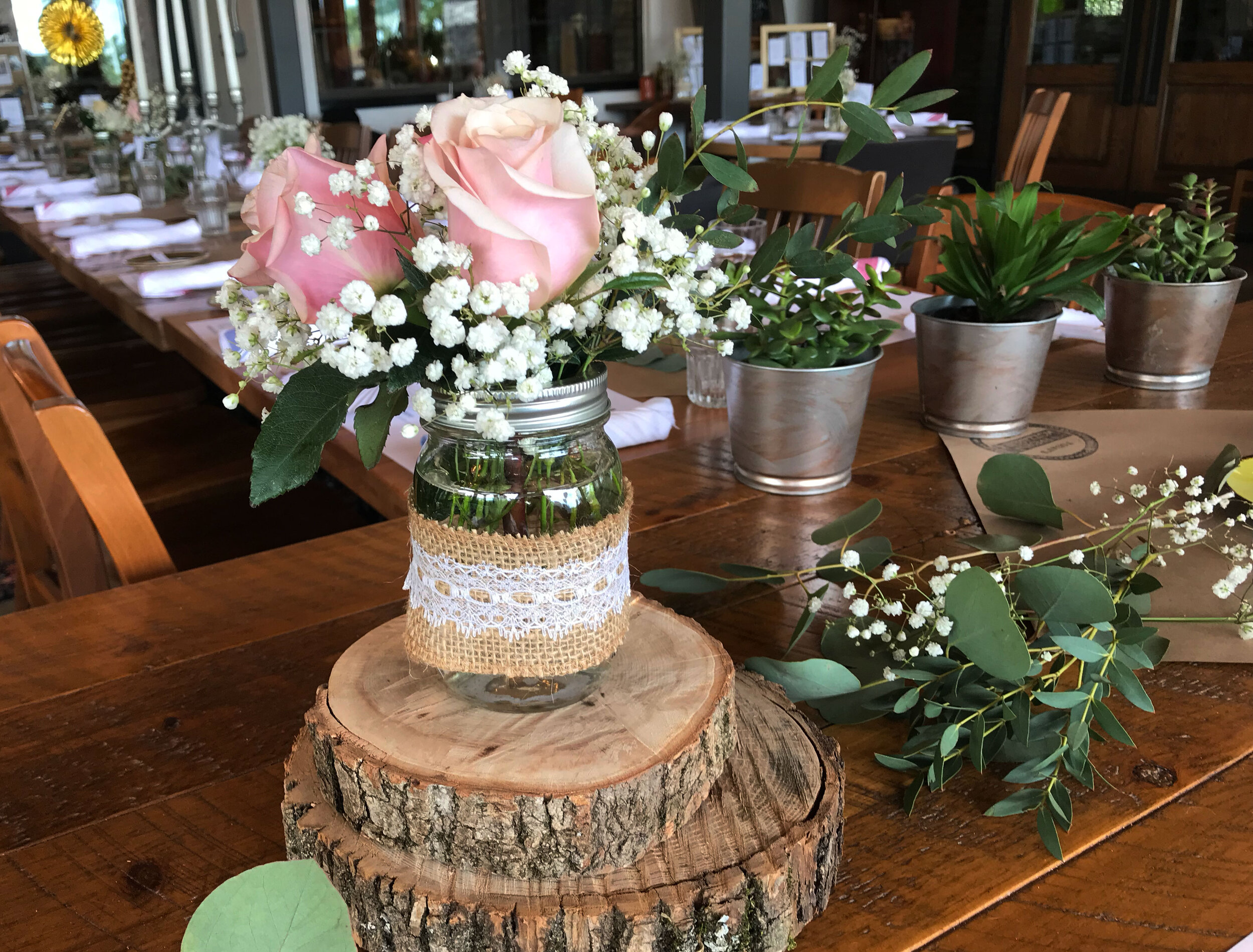 diana-andres-rustic-mason-jar-rose-centerpieces.jpg