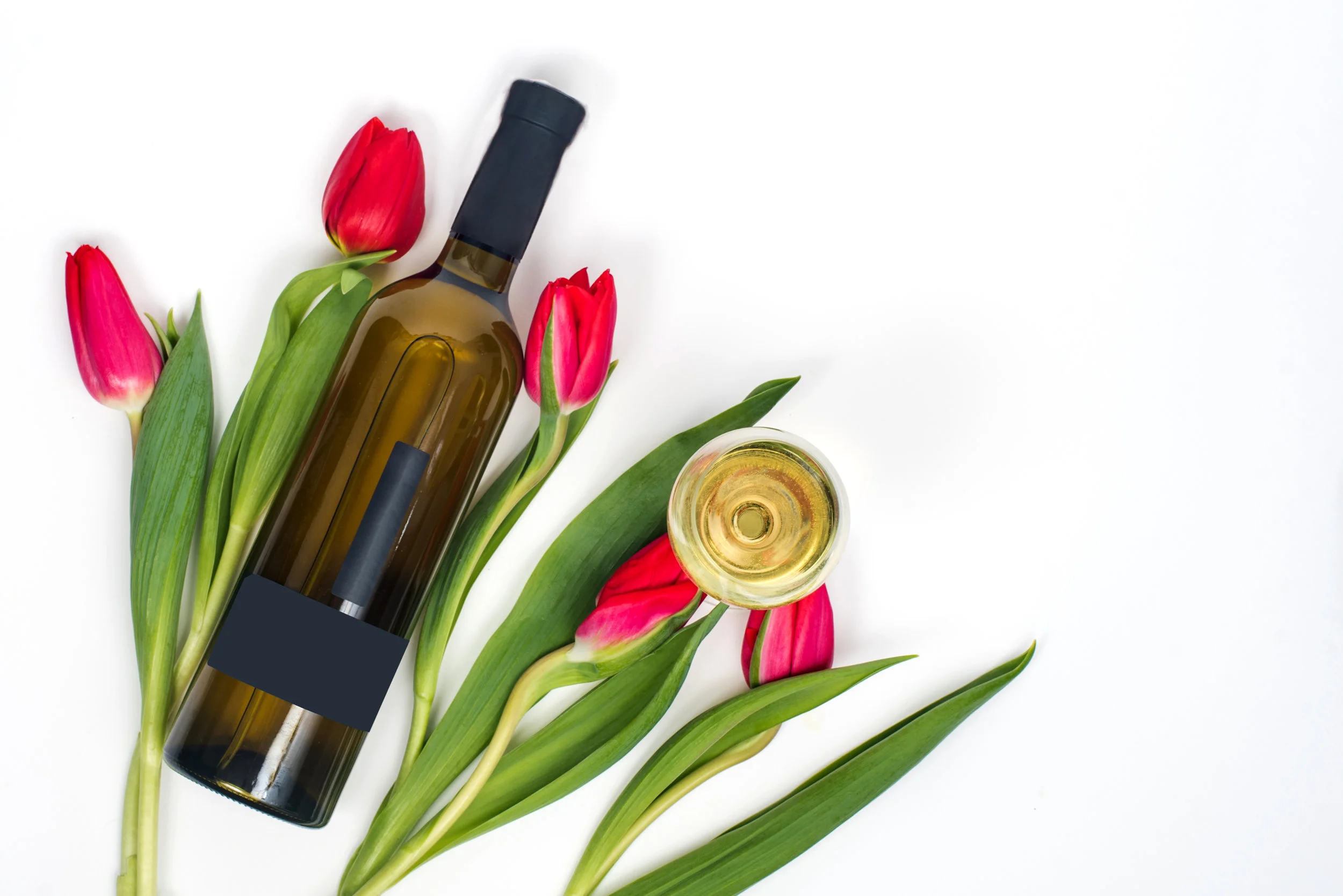 (2.21) Wine bottle surrounded by flowers.jpg