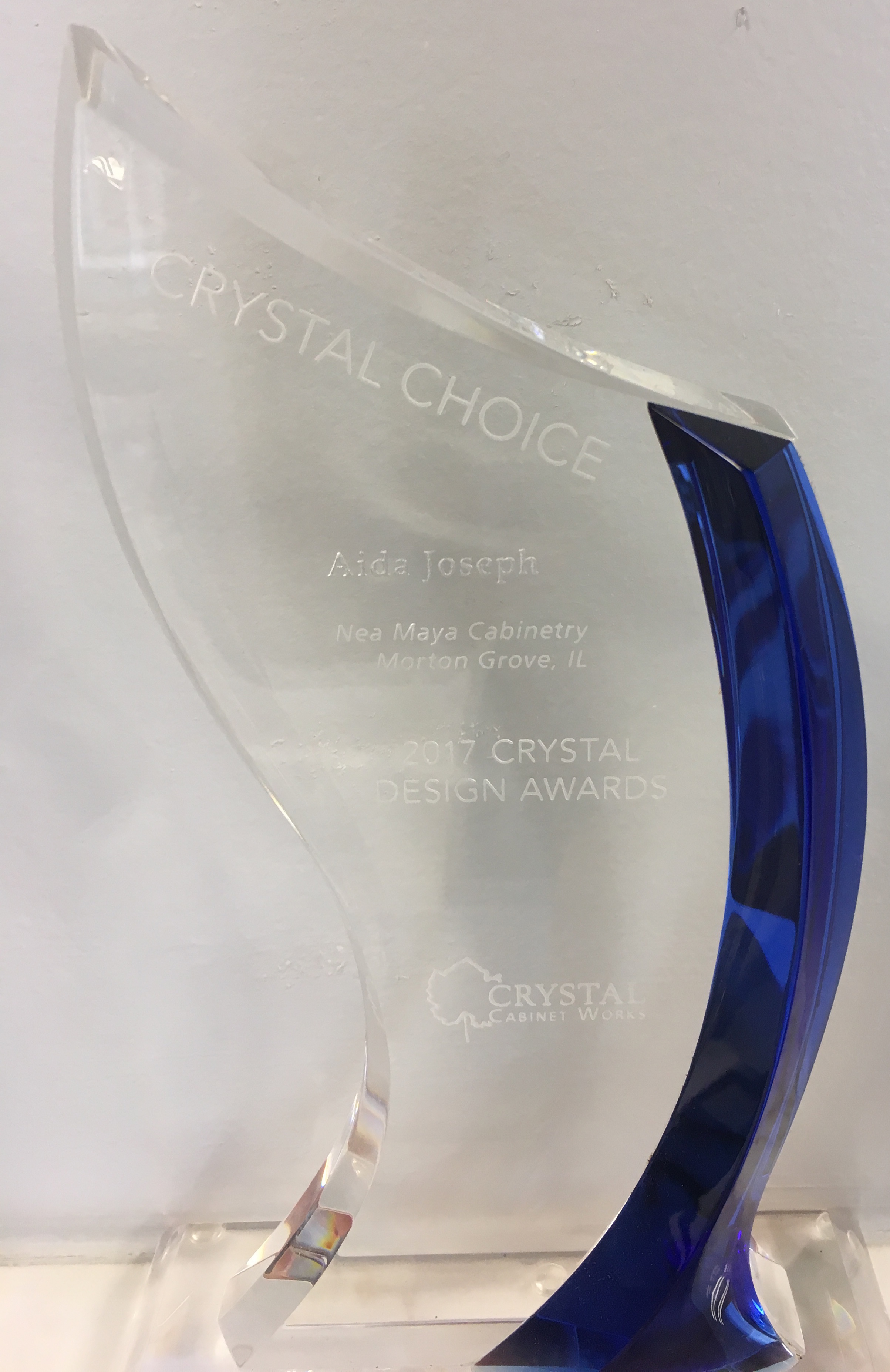 Aida Joseph received this 2017 design award in a national competition from crystal cabinets.