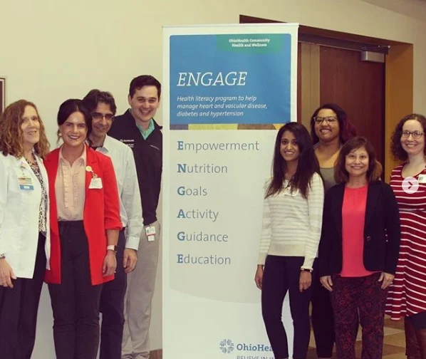 Residents and faculty present ENGAGE , a community diabetes program.
