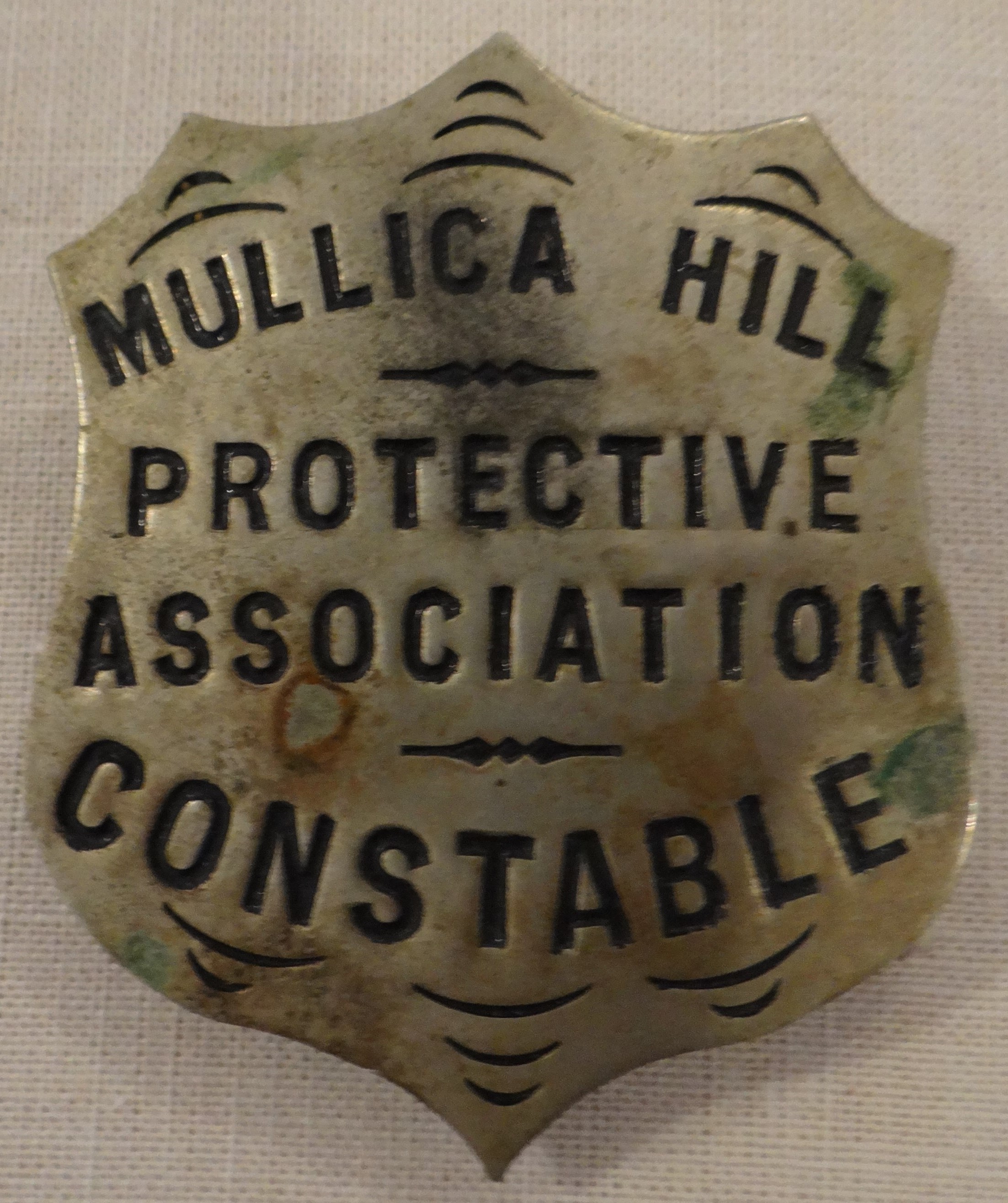   Constable Badge, Mullica Hill Protective Association for the Recovery of Stolen Horses. Mullica Hill, NJ, c1900. The Association, founded in 1896, registered horses, carriages and equipment and was formed to apprehend thieves and recover stolen pro