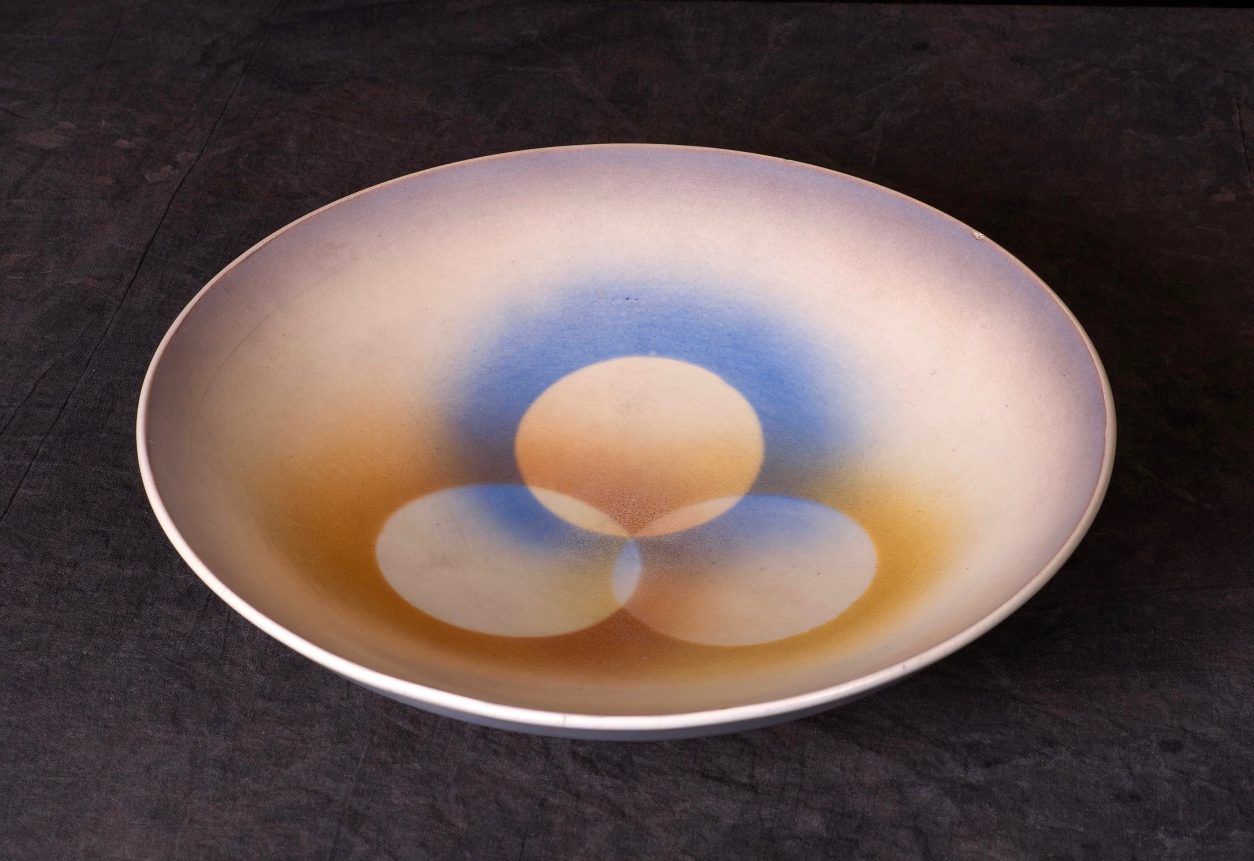 #108 Bowl, form 3120, dec.58, Karlsruhe. Form and decoration by Martha Katzer, 1929, in production 1930-1938. Black 3120/58; 7.5 cm H, 31.6 cm Ø. RM2737