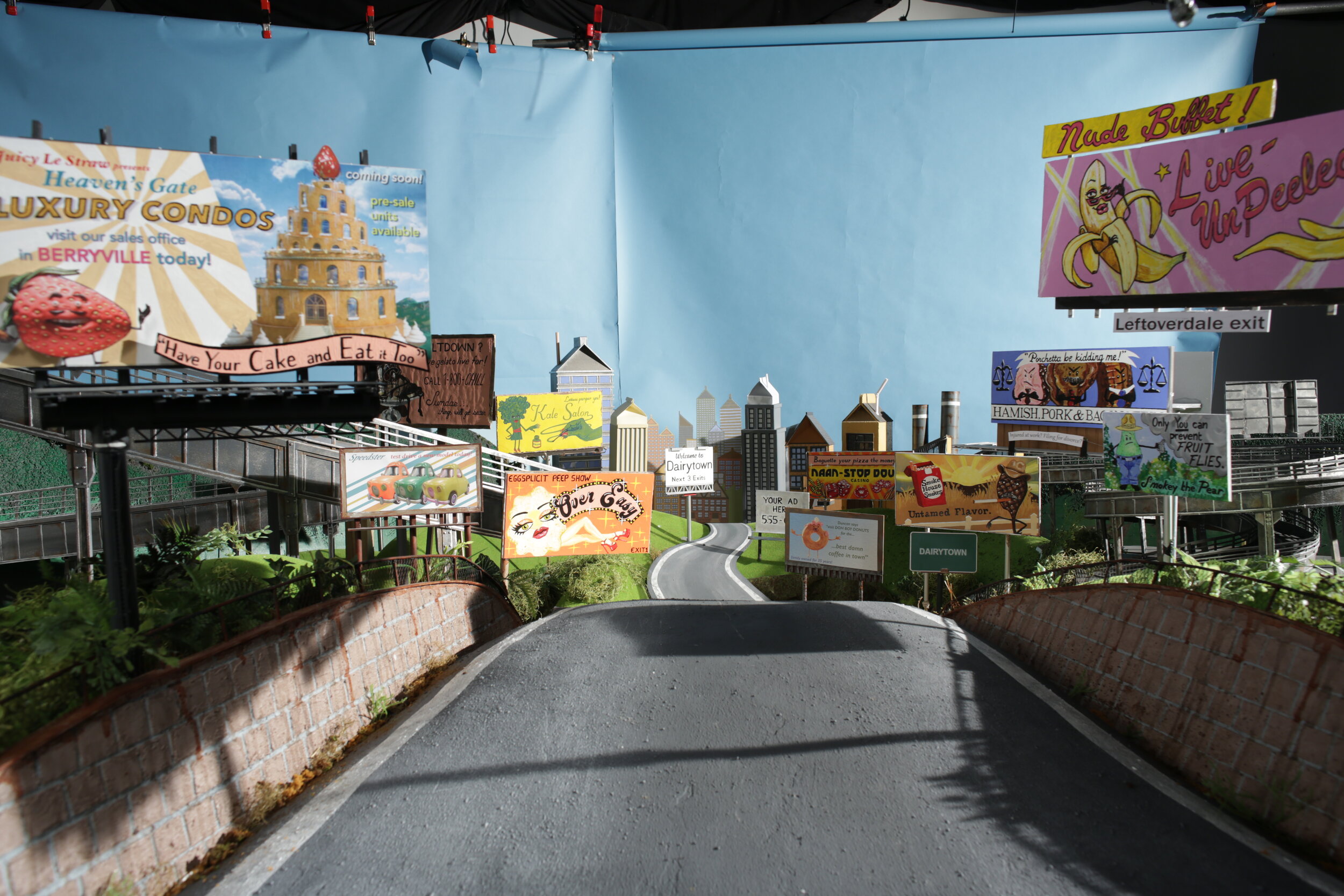 Entire set fabrication for establishing shot (hills and some billboards are repurposed, pictured in progress.)