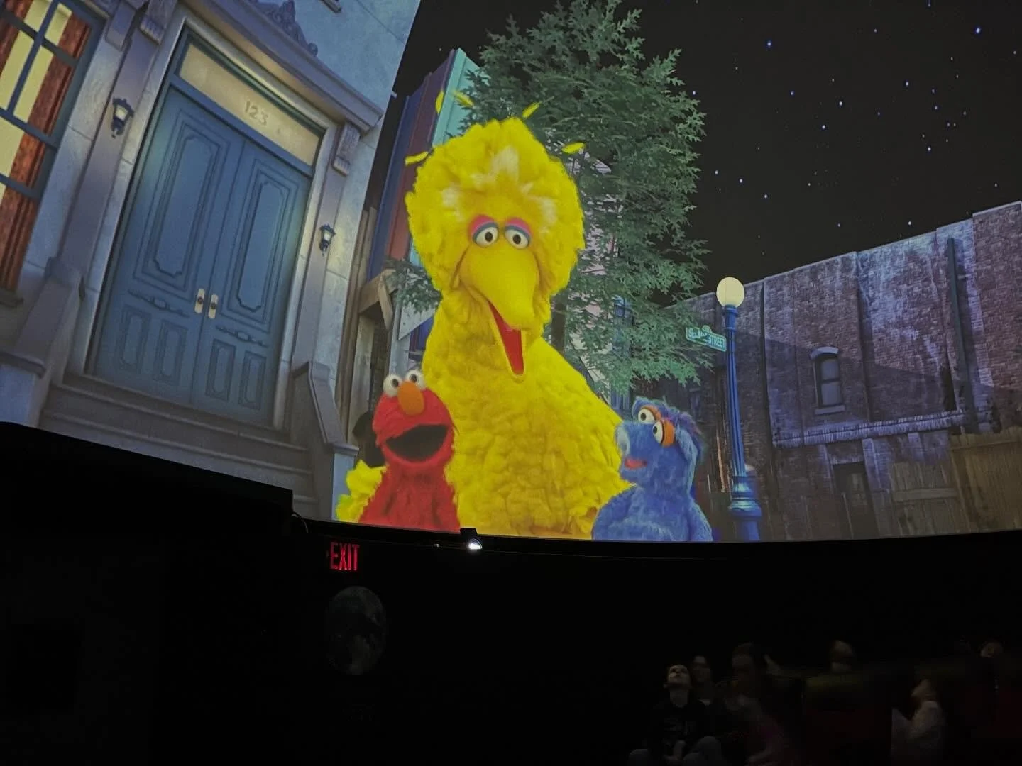 Sesame Street video produced by various Chinese government organizations playing to kids in the Science Center.

Would have been more fun if this weren&rsquo;t our second viewing. Zzzzz