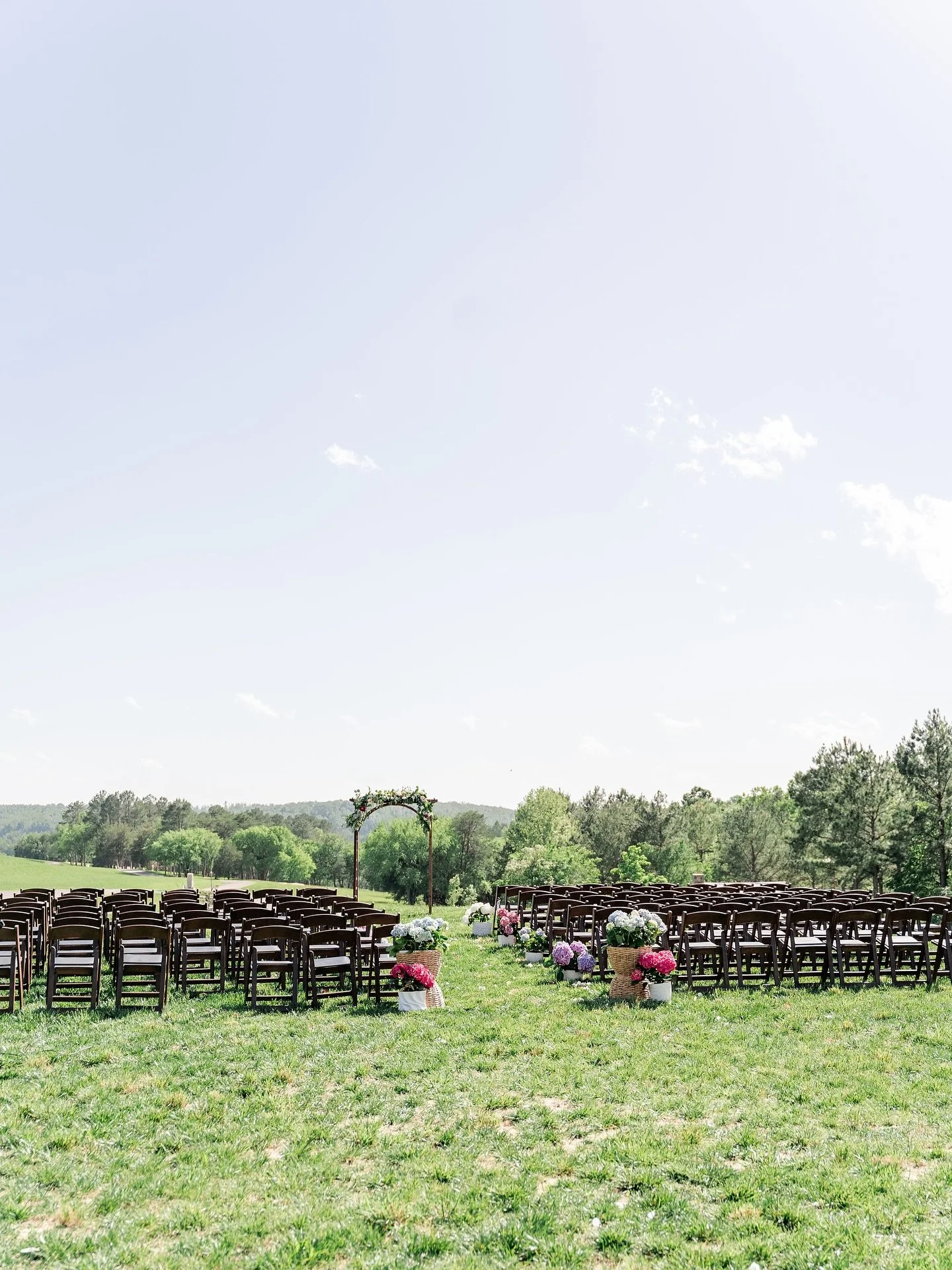 Hydrangeas as aisle markers? Always. Ribbons blowing dramatically in the wind? A gift. The kind of joy you can&rsquo;t even plan for? That&rsquo;s the real beauty.

Vendors: @oflaceandlinen @camrynelizabethphoto @rassawekweddings @simplyslicedenterta