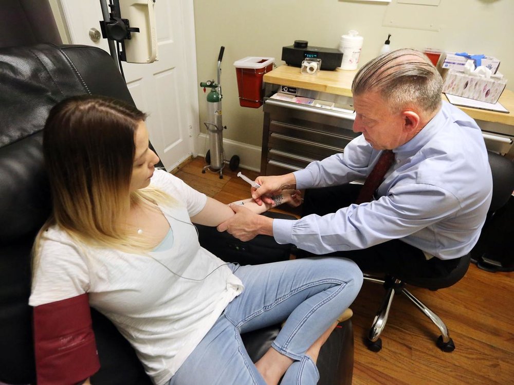  Dr. Richard Bowen of the Charleston Ketamine Center prepares patient Jacinda Standley for her ketamine infusion treatment  Monday, March 11, 2019. Brad Nettles/Staff Bnettles@postandcourier.com 