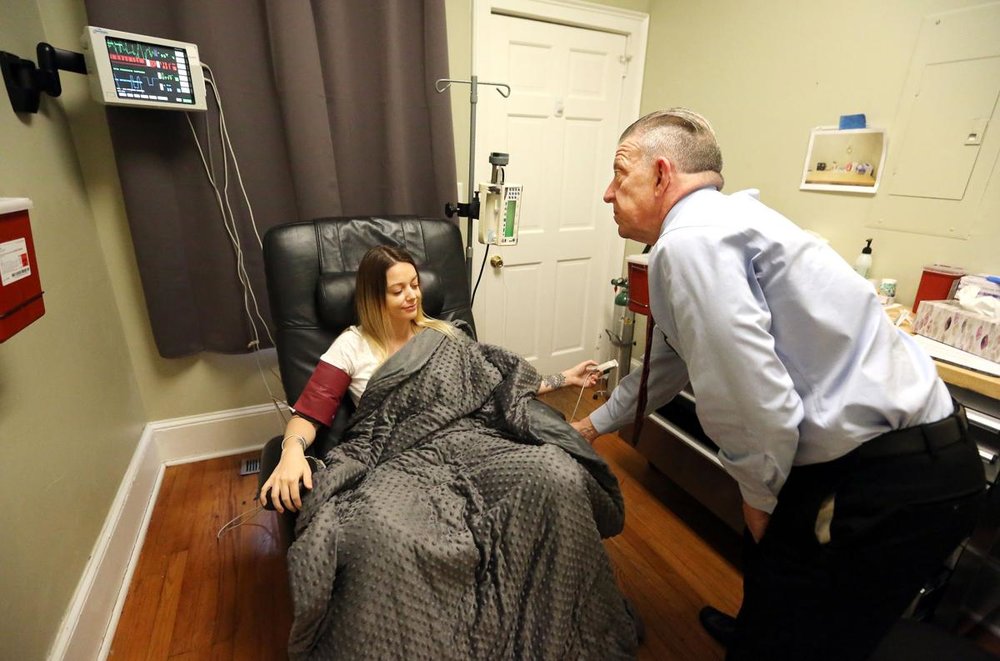  Dr. Richard Bowen of the Charleston Ketamine Center checks on patient Jacinda Standley during her ketamine infusion treatment  Monday, March 11, 2019. Brad Nettles/Staff Bnettles@postandcourier.com 